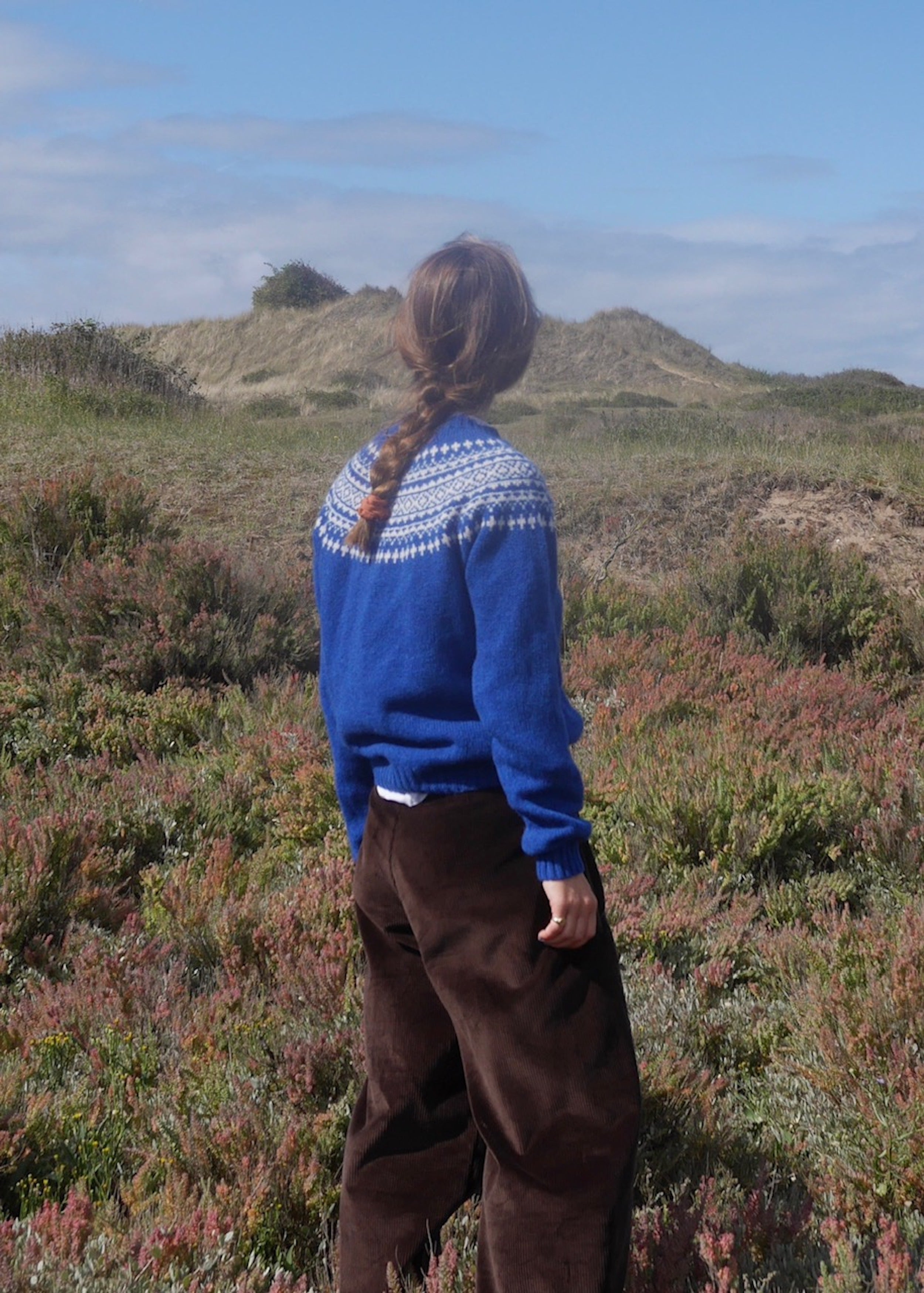 Decca wears Carrier Company Shetland Lambswool Jumper in Sea & Sky