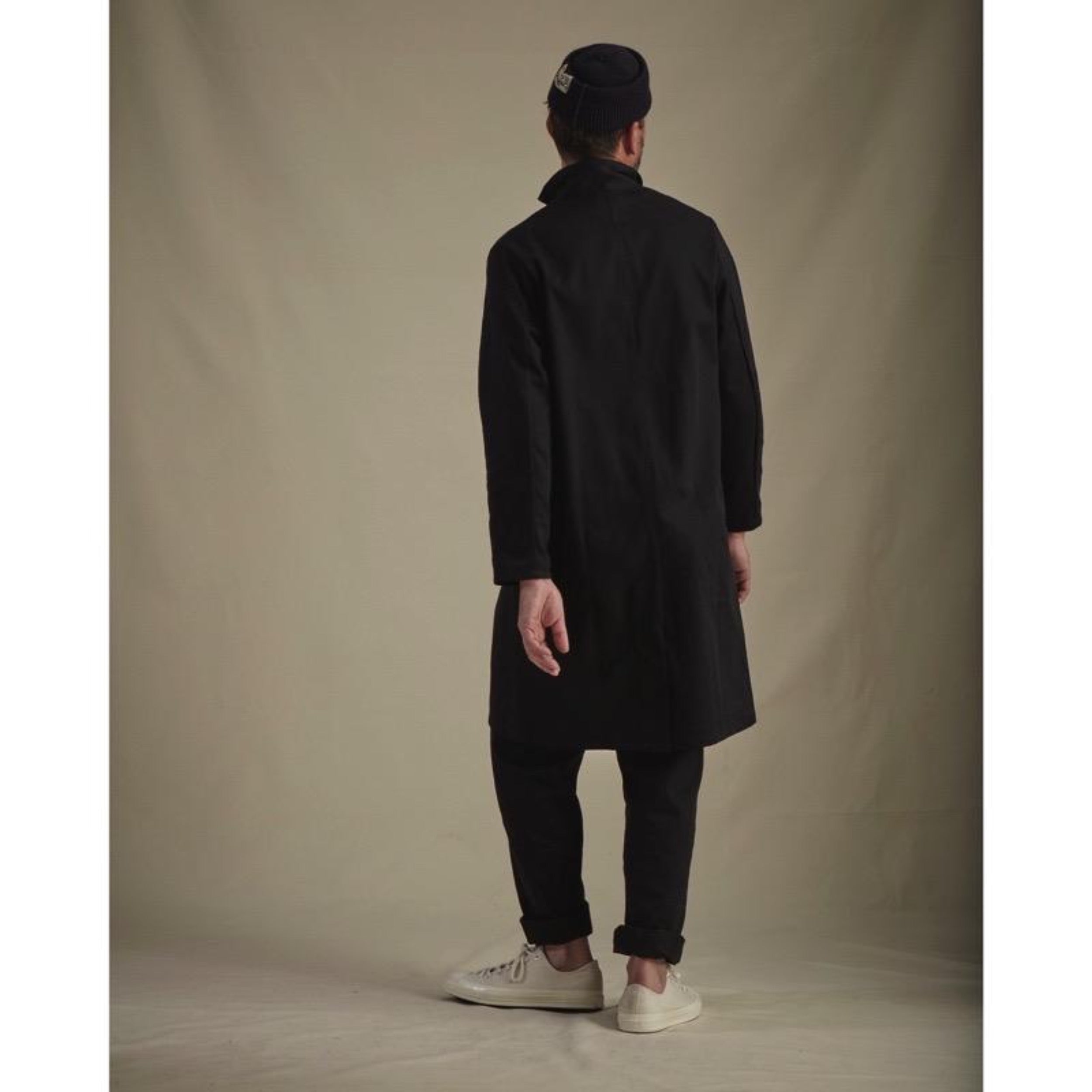 Man wearing Carrier Company Stockman's Coat in Black Drill and Black Men's Dungarees