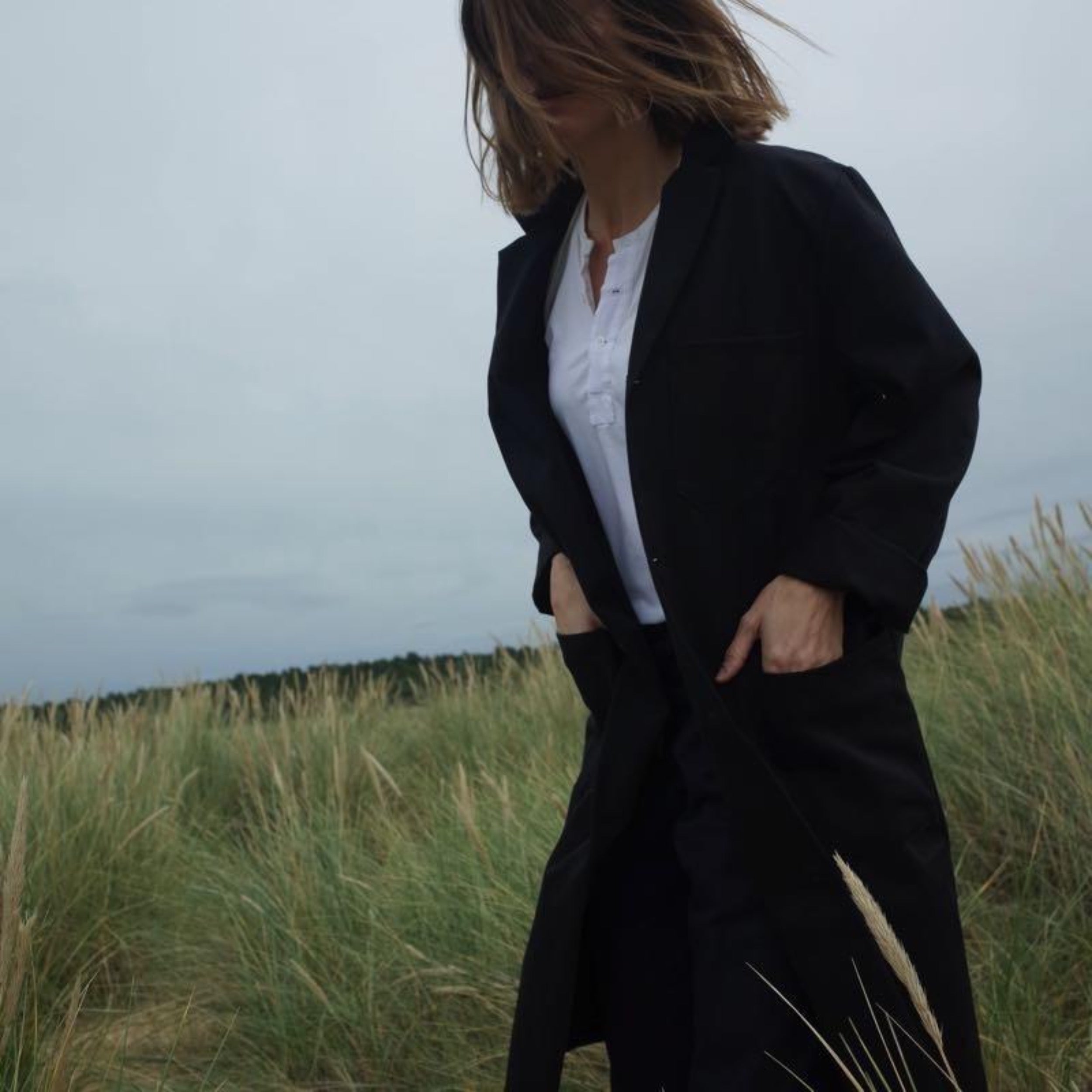 Sienna wears Stockman's Coat in Black Drill