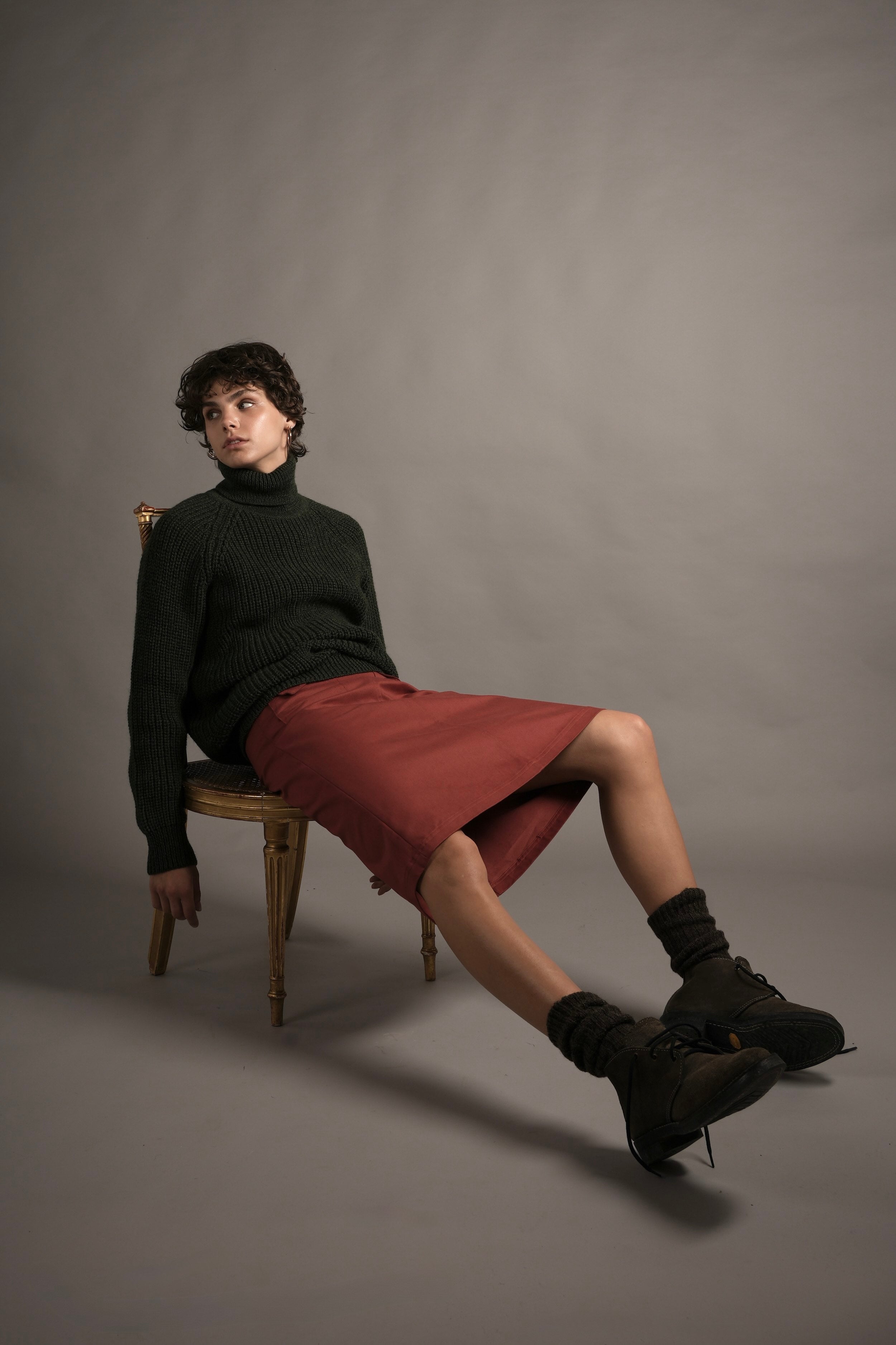 Els Wears Carrier Company Mum Skirt In Terracotta With Fisherman's Jumper in Green