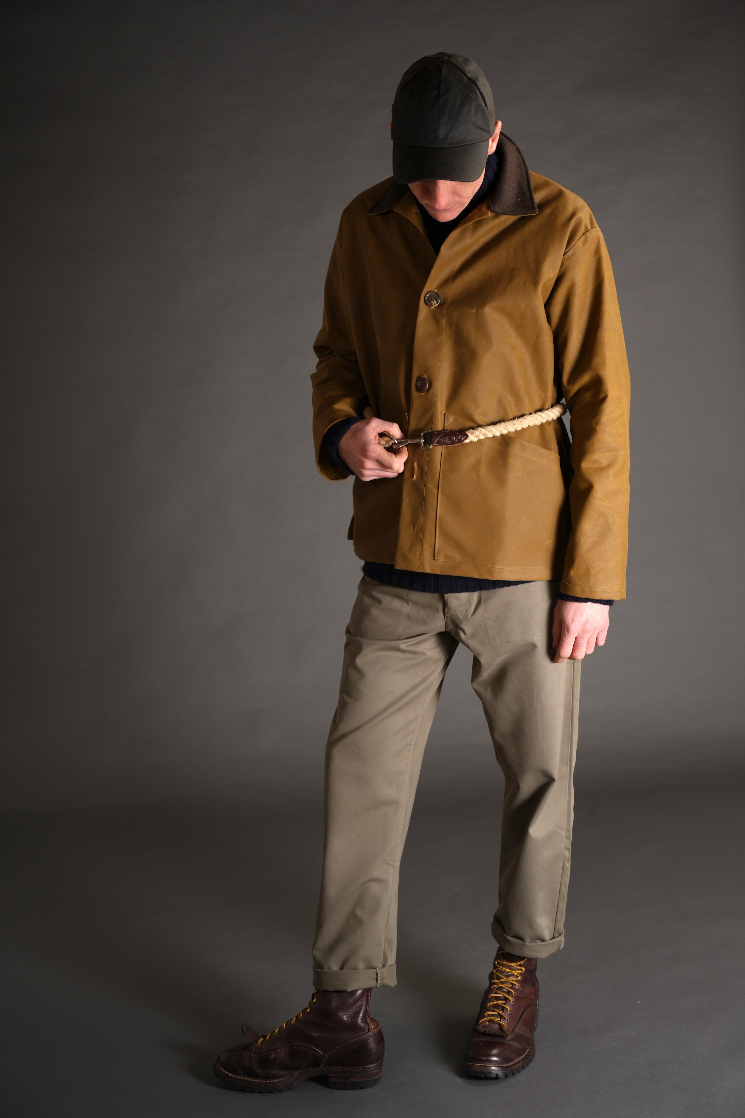 Tommy Wears Carrier Company Oilskin Cap In Olive