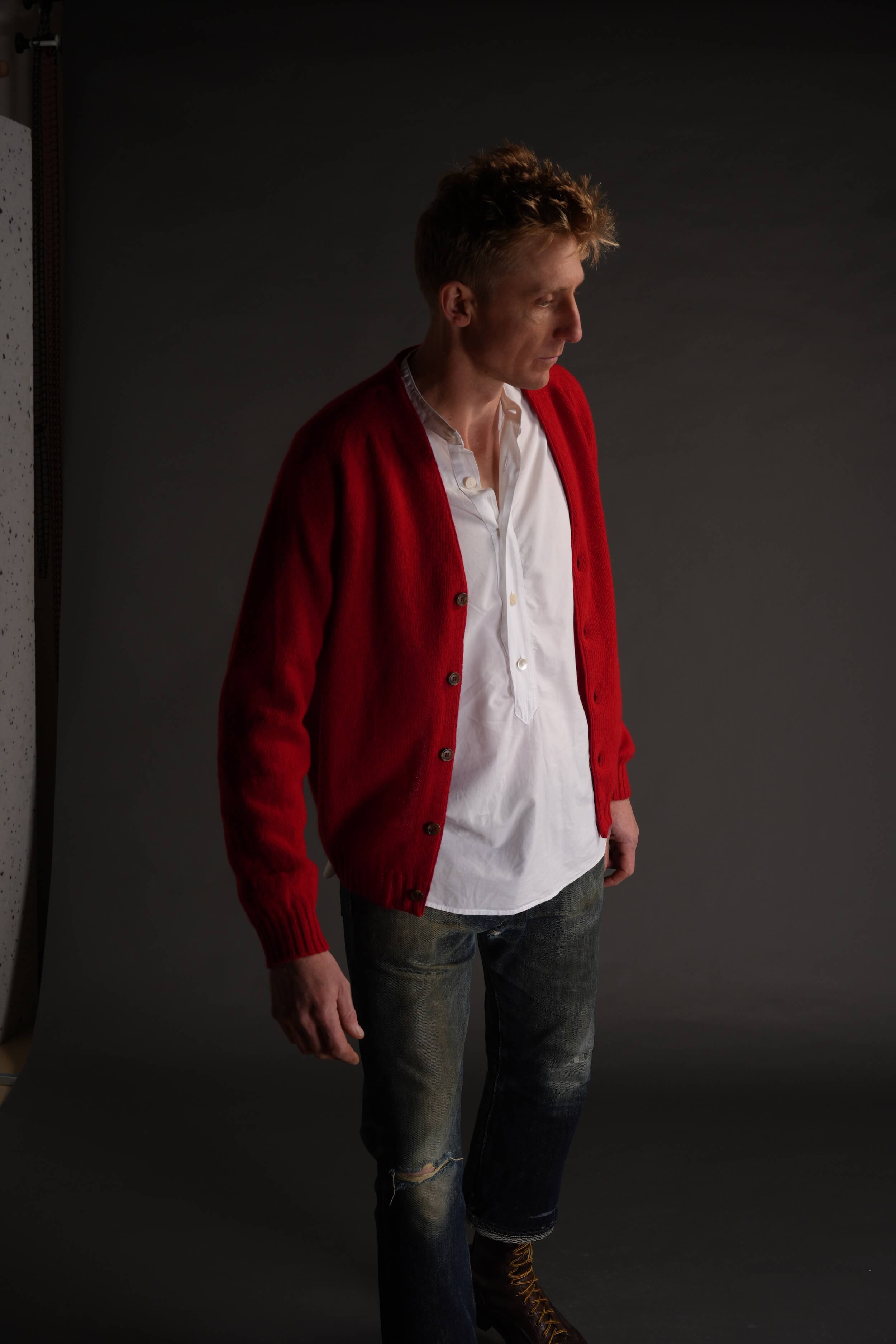 Tommy Wears Carrier Company Cardigan in Ruby