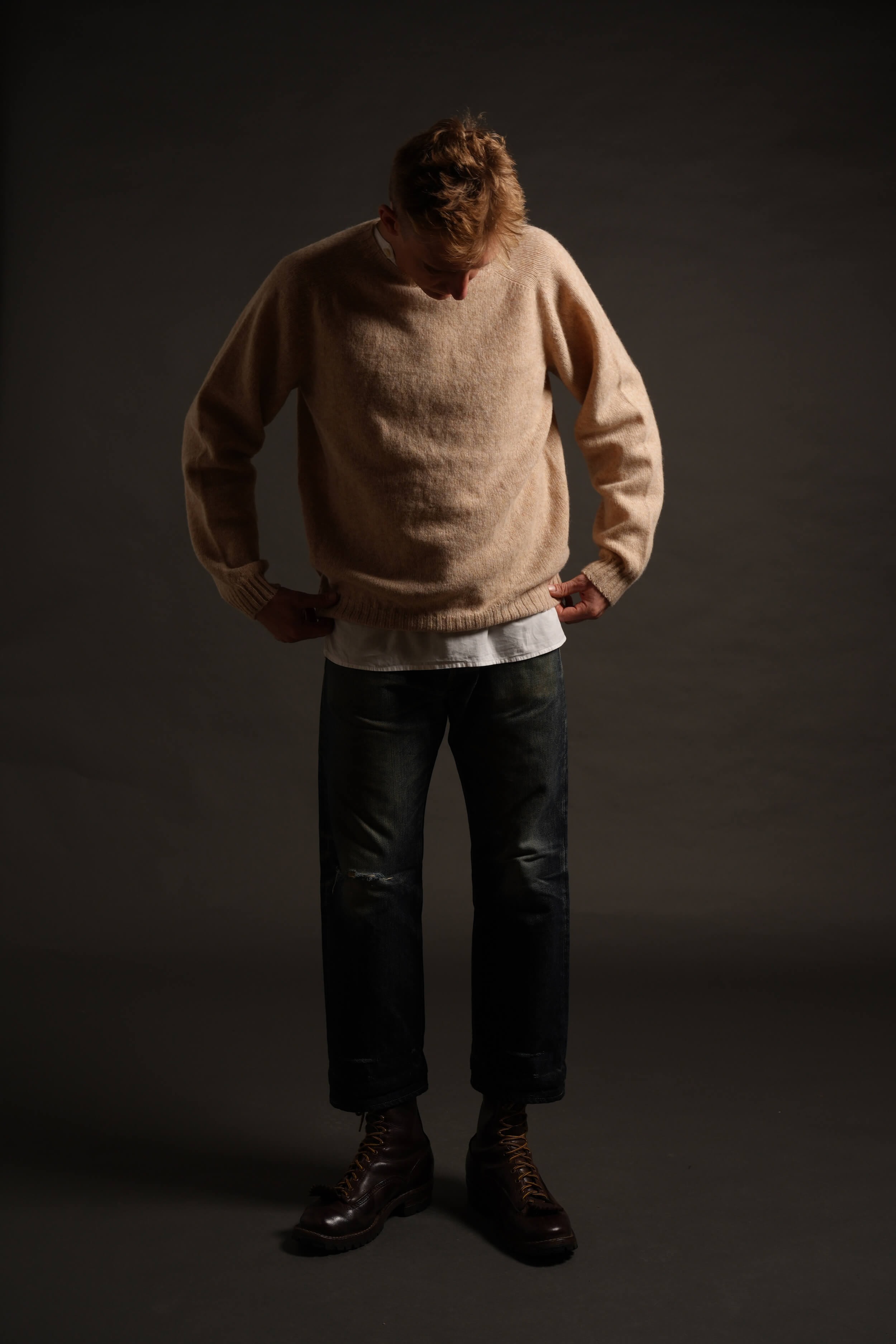 Tommy is 6'4" and wears a XXL jumper