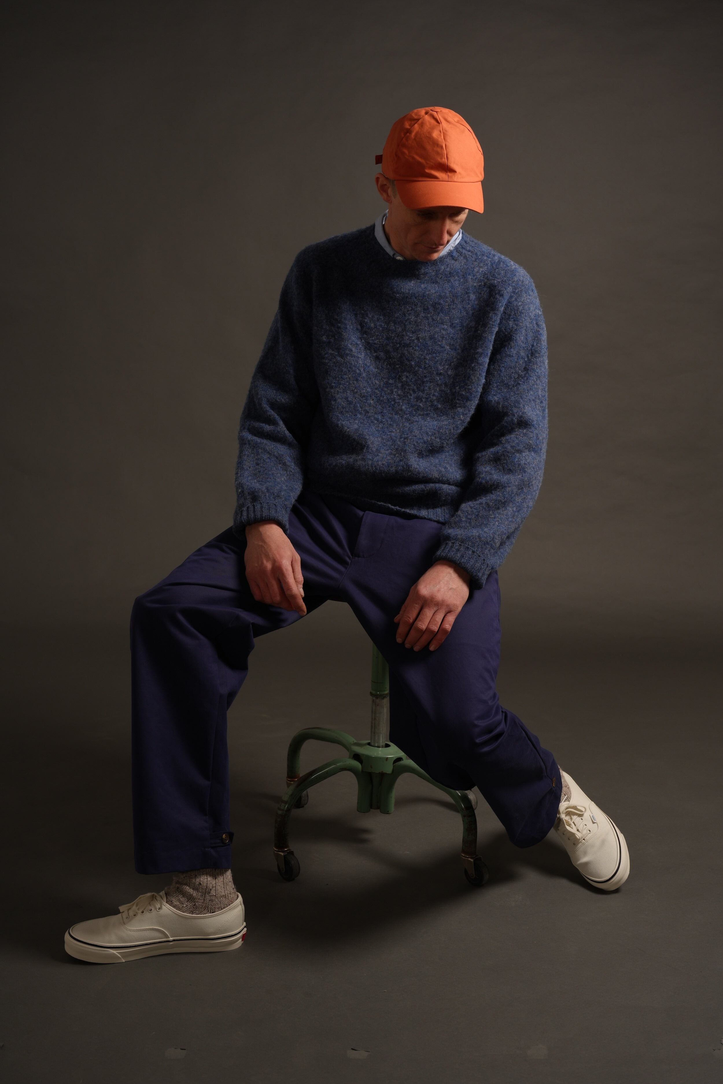 Tommy is 6'4" and wears an XL jumper