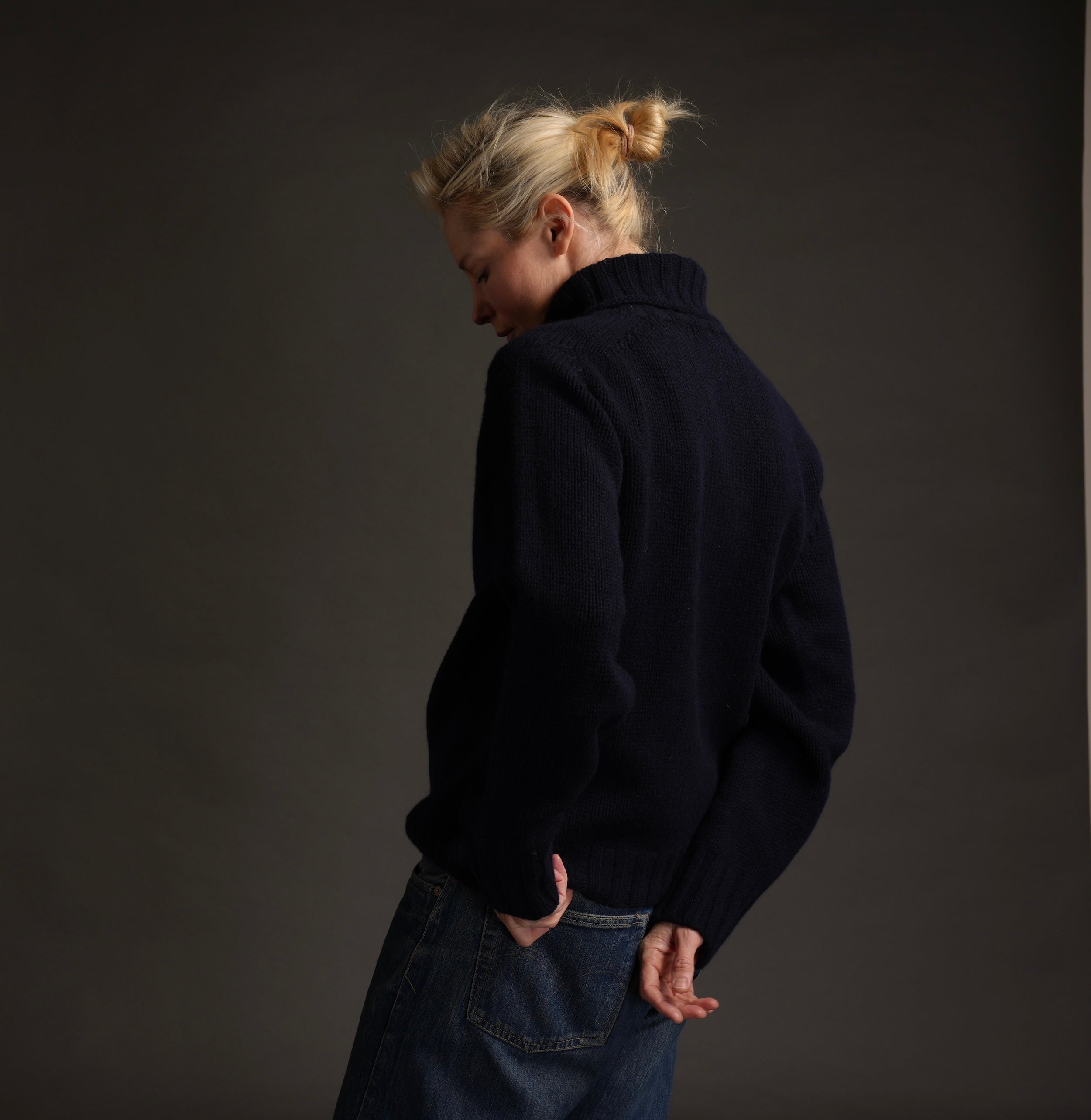 Sienna wears Navy Rollneck Supersoft Shetland jumper