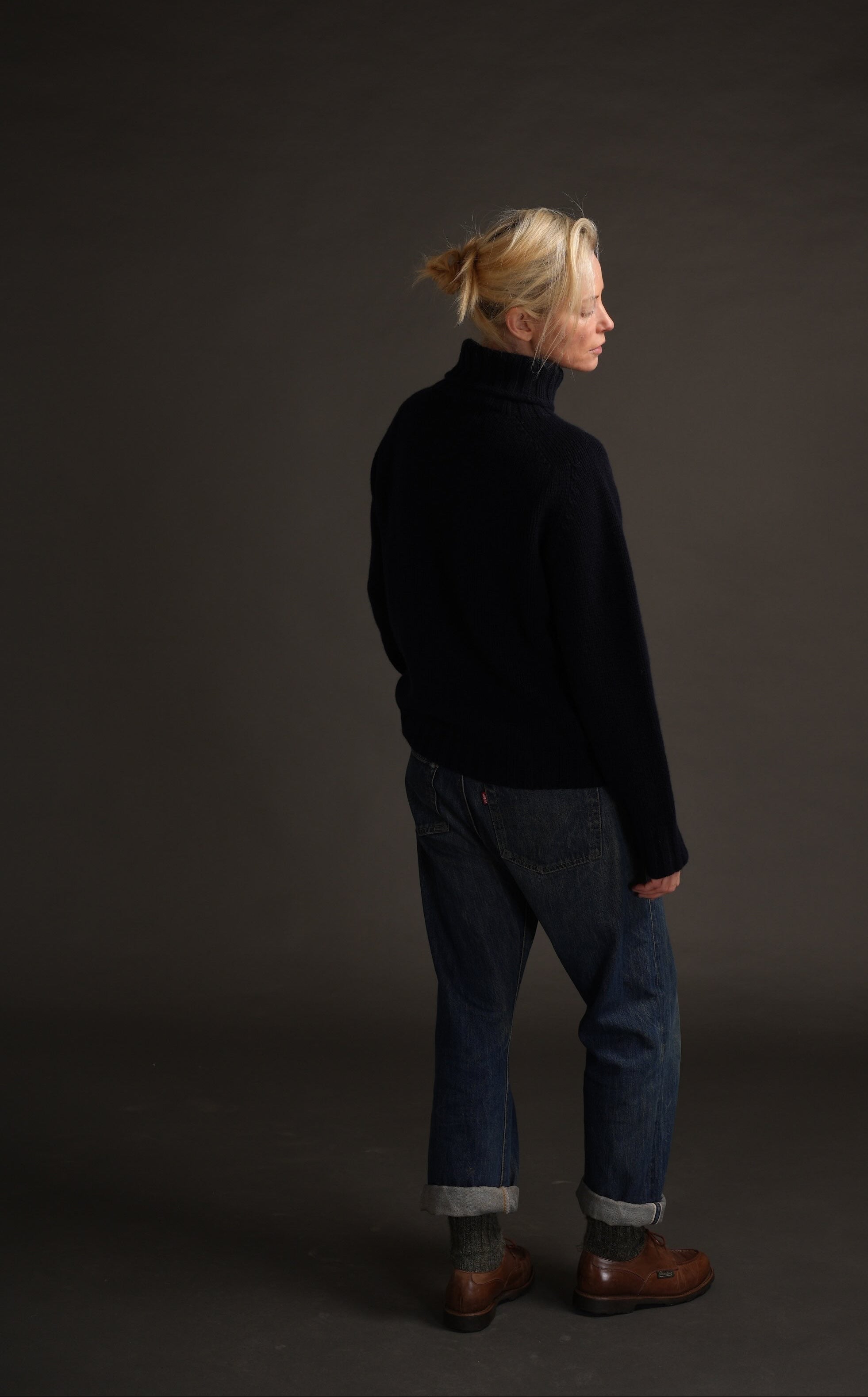 Sienna wears Navy Rollneck Supersoft Shetland jumper