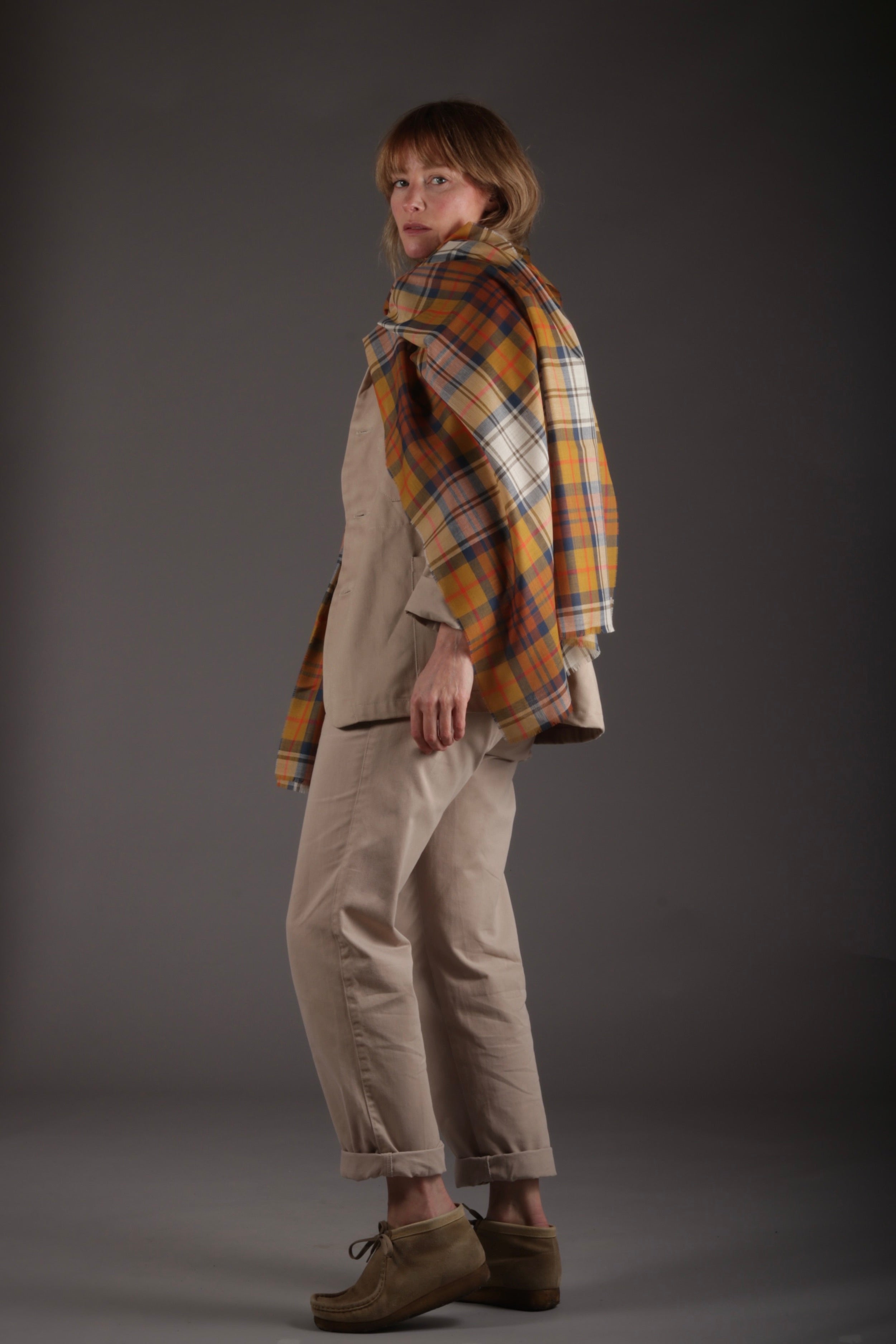 Sienna wears Carrier Company Extra Fine Merino Scarf with Three Button jacket and High Waist Trousers