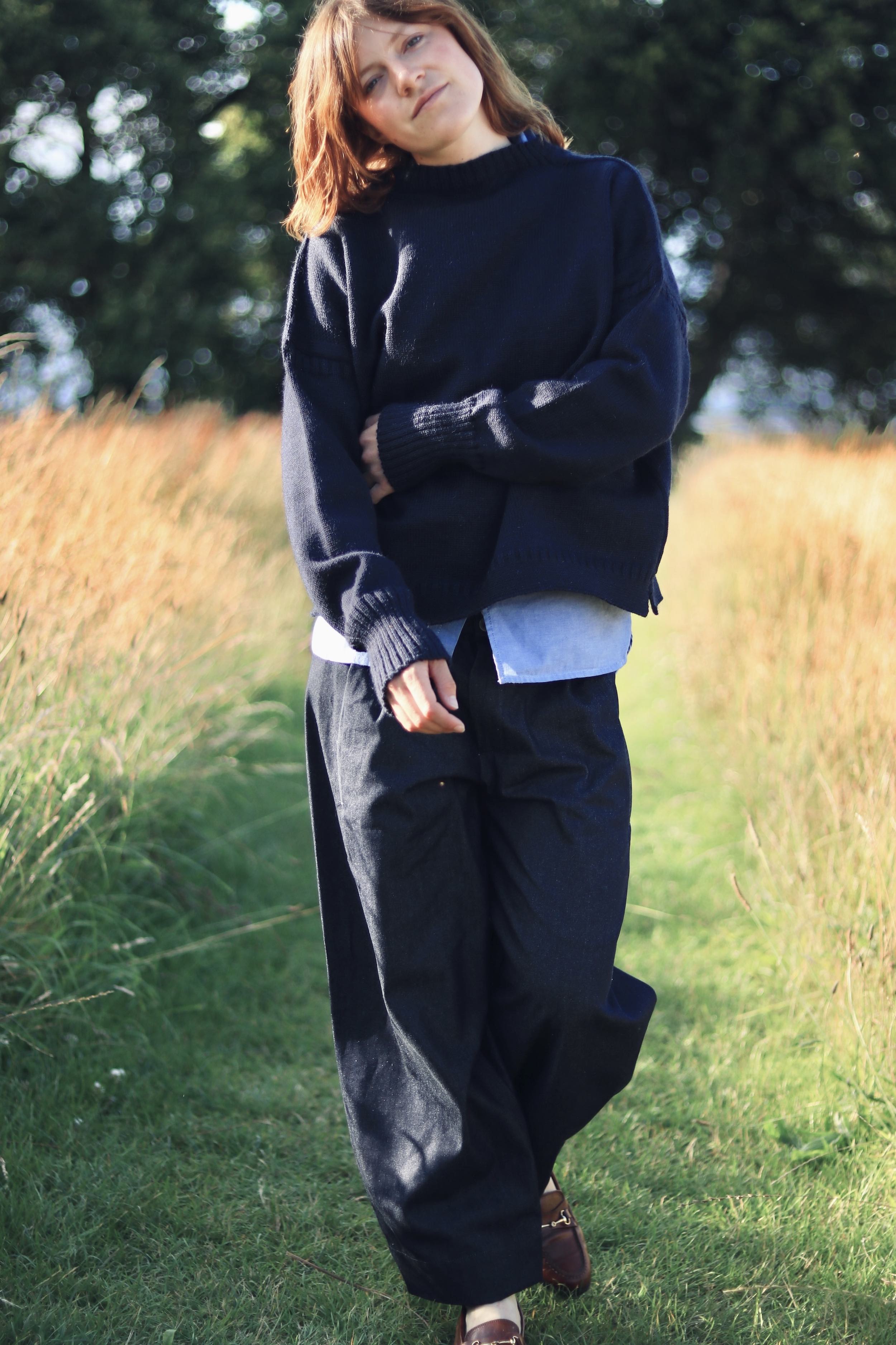Minna wears Carrier Company Le Tircoteur Premium Cropped Guernsey in Navy