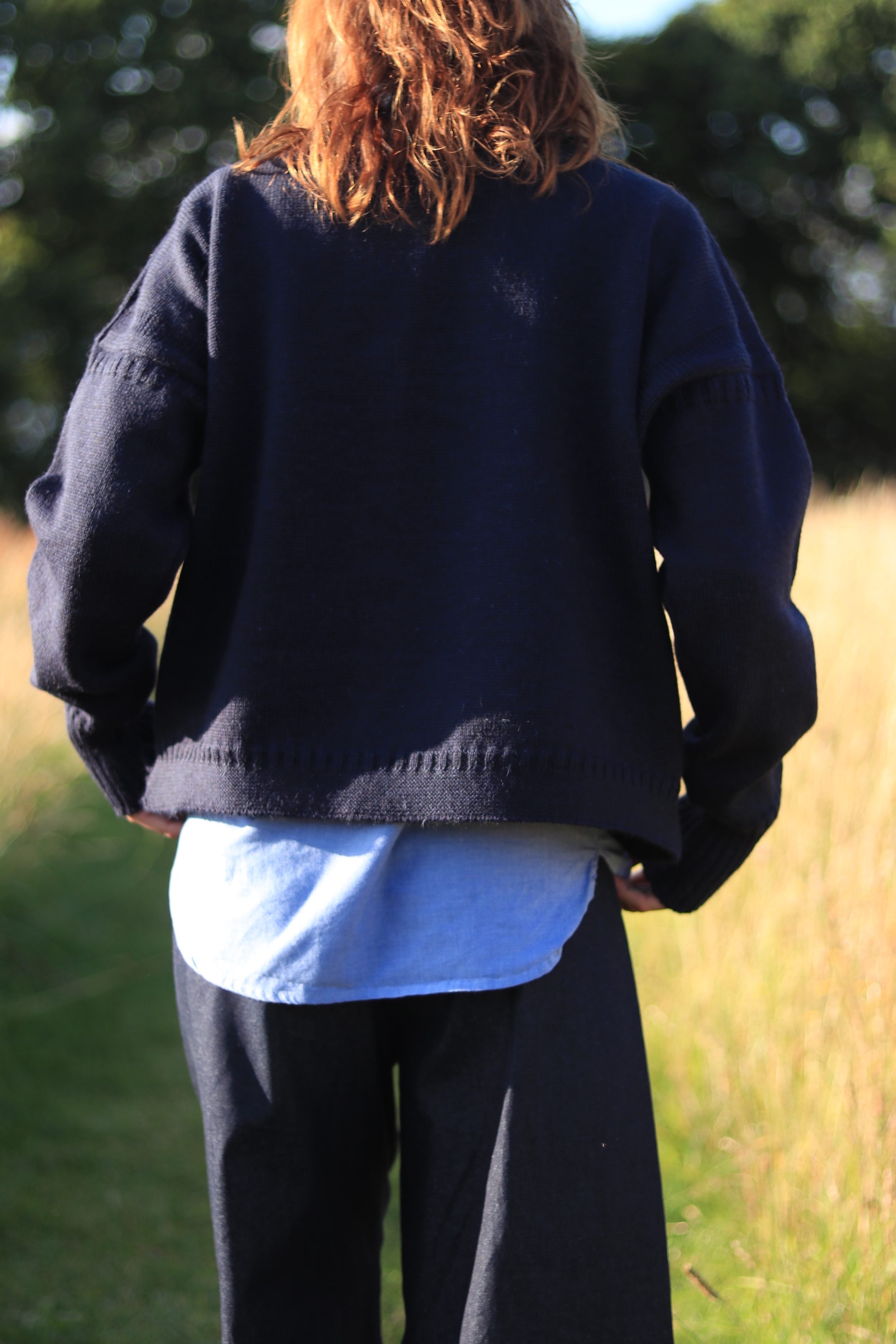 Minna wears Carrier Company Le Tircoteur Premium Cropped Guernsey in Navy