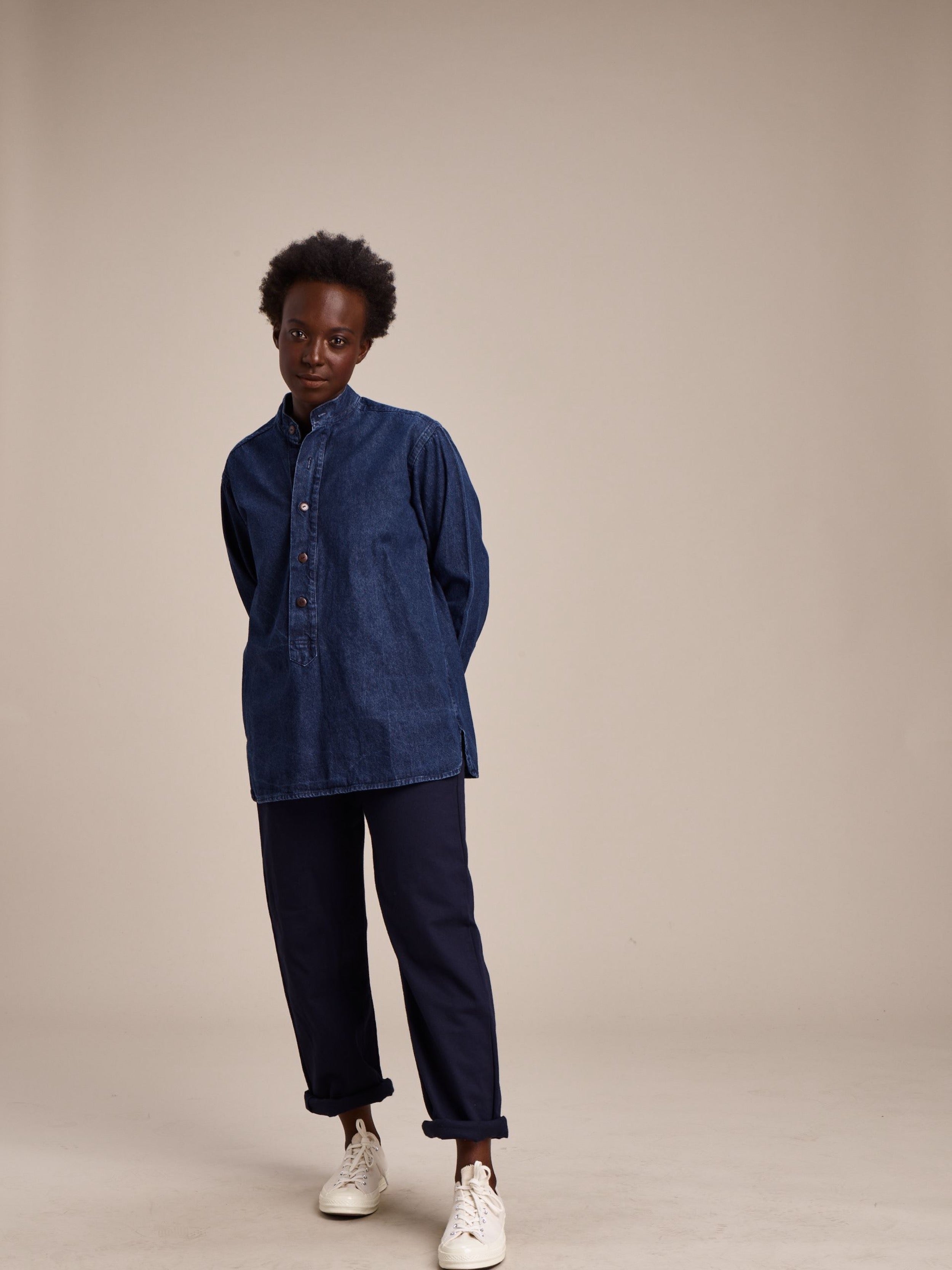 Woman wearing Carrier Company Women's Work Trouser in Navy and Denim Work Shirt