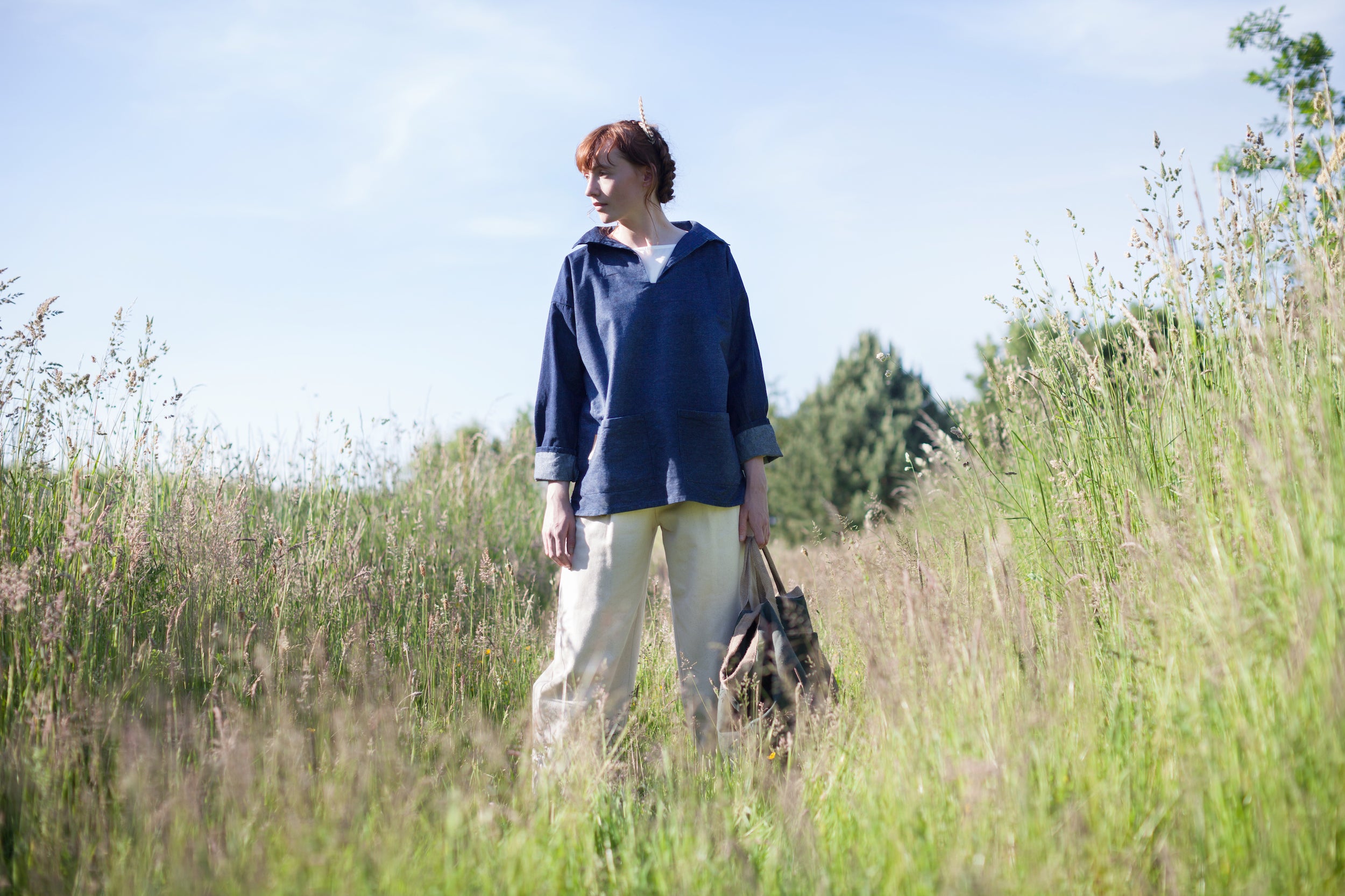 Woman wears Carrier Company Dutch Trouser in Seeded Denim