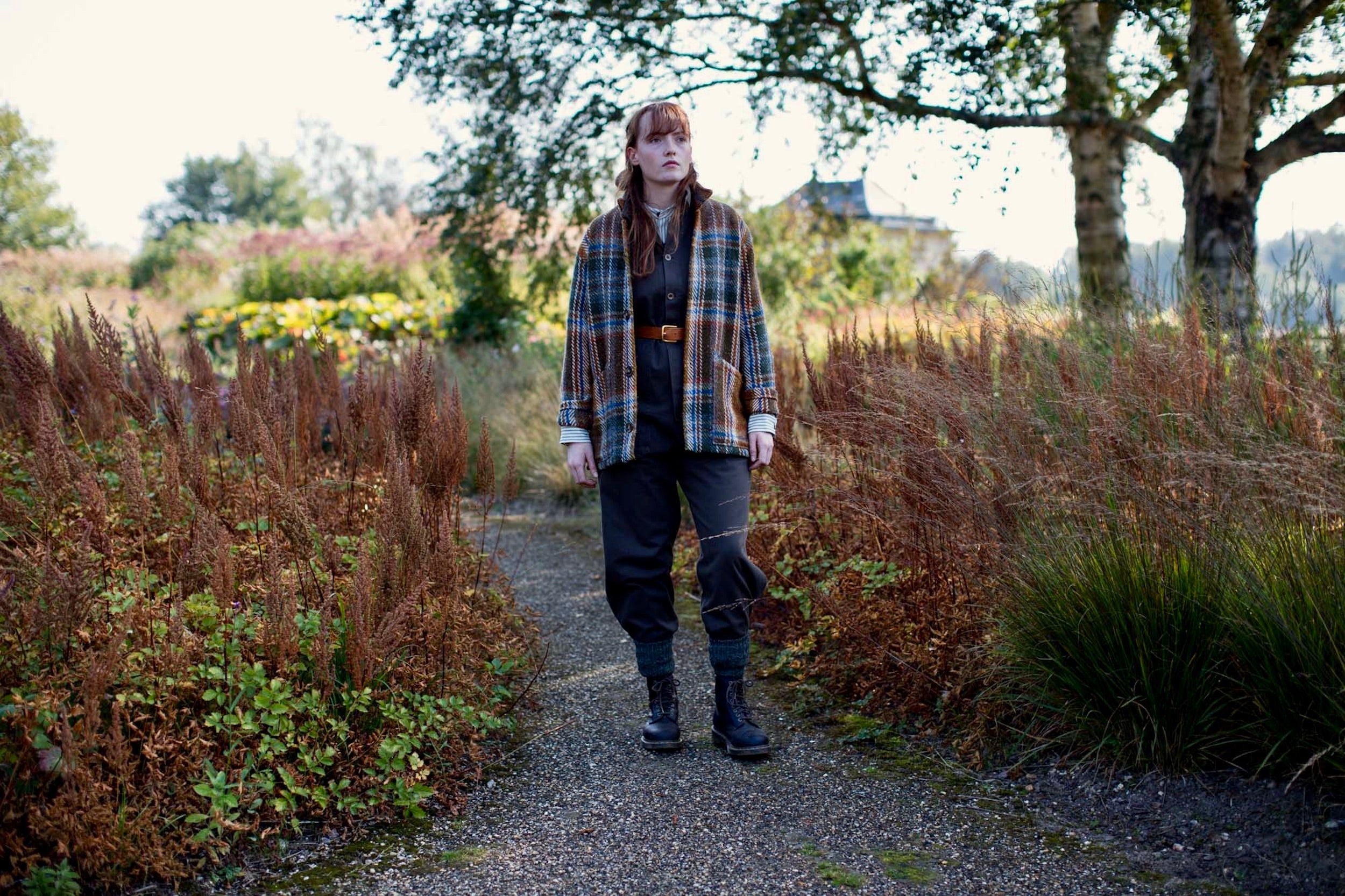 Woman wears Carrier Company Celtic Wool Jacket in Russett