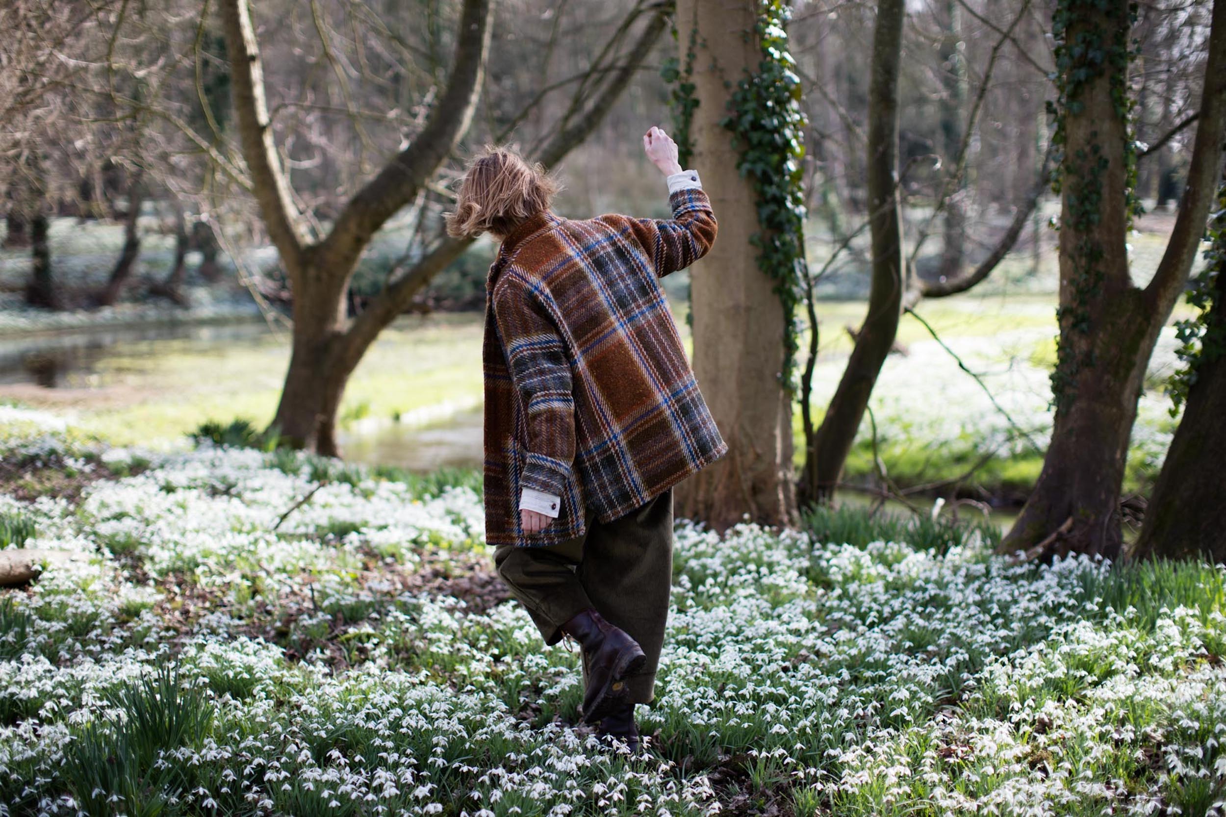 Woman wears Carrier Company Celtic Wool Jacket in Russett