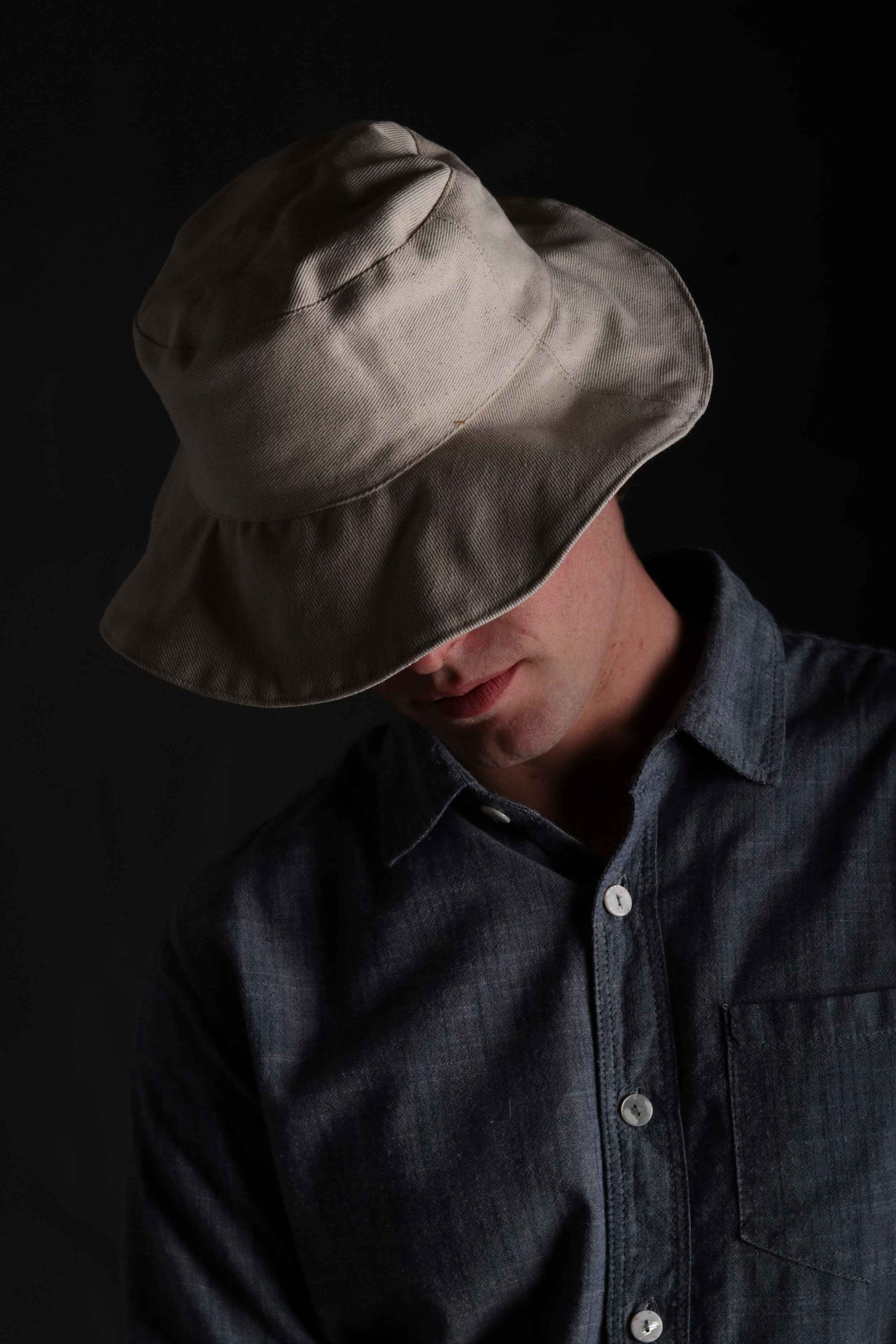 Man wearing Carrier Company Cotton Sun Hat