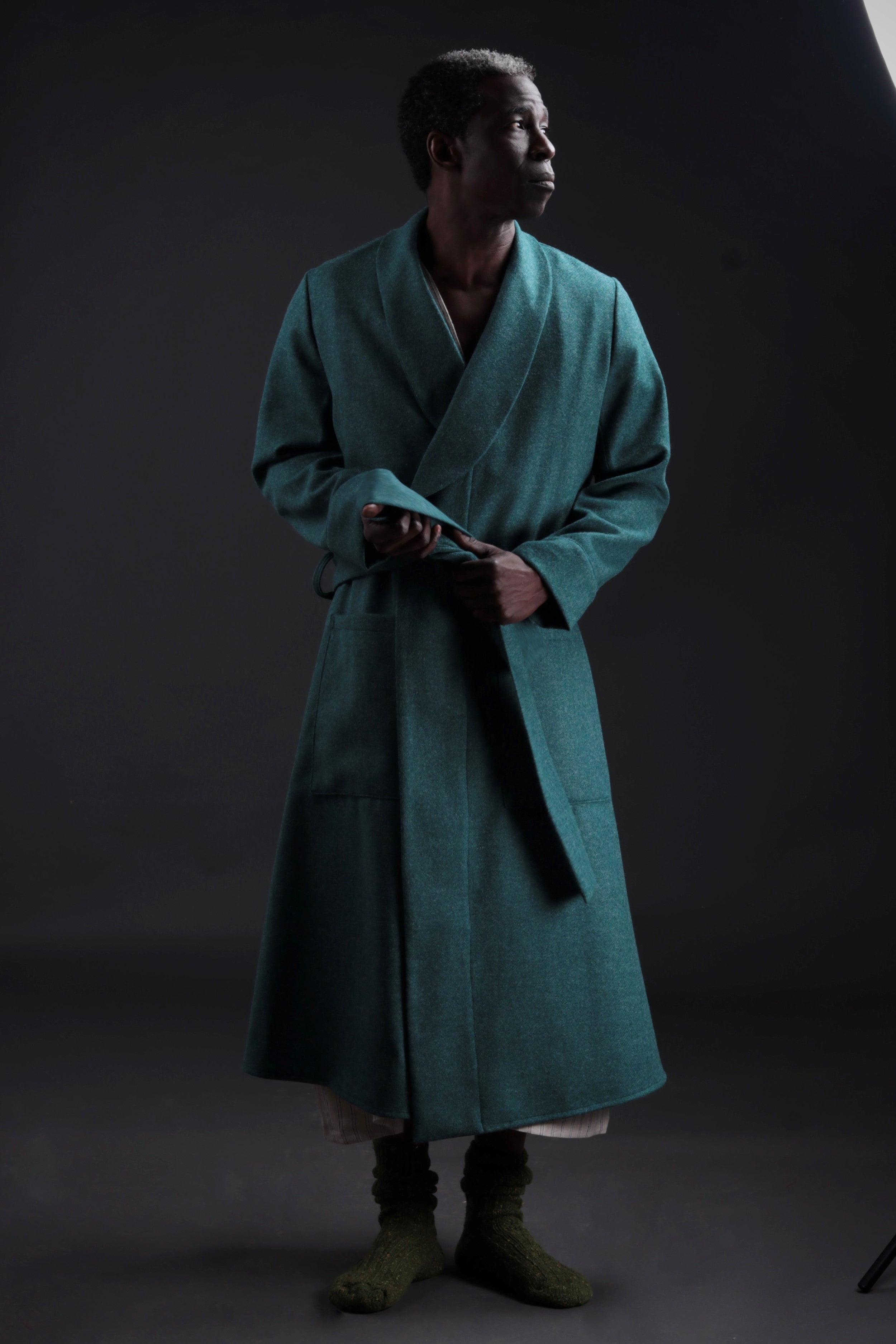 Man wears Carrier Company Wool Dressing Gown in New Teal