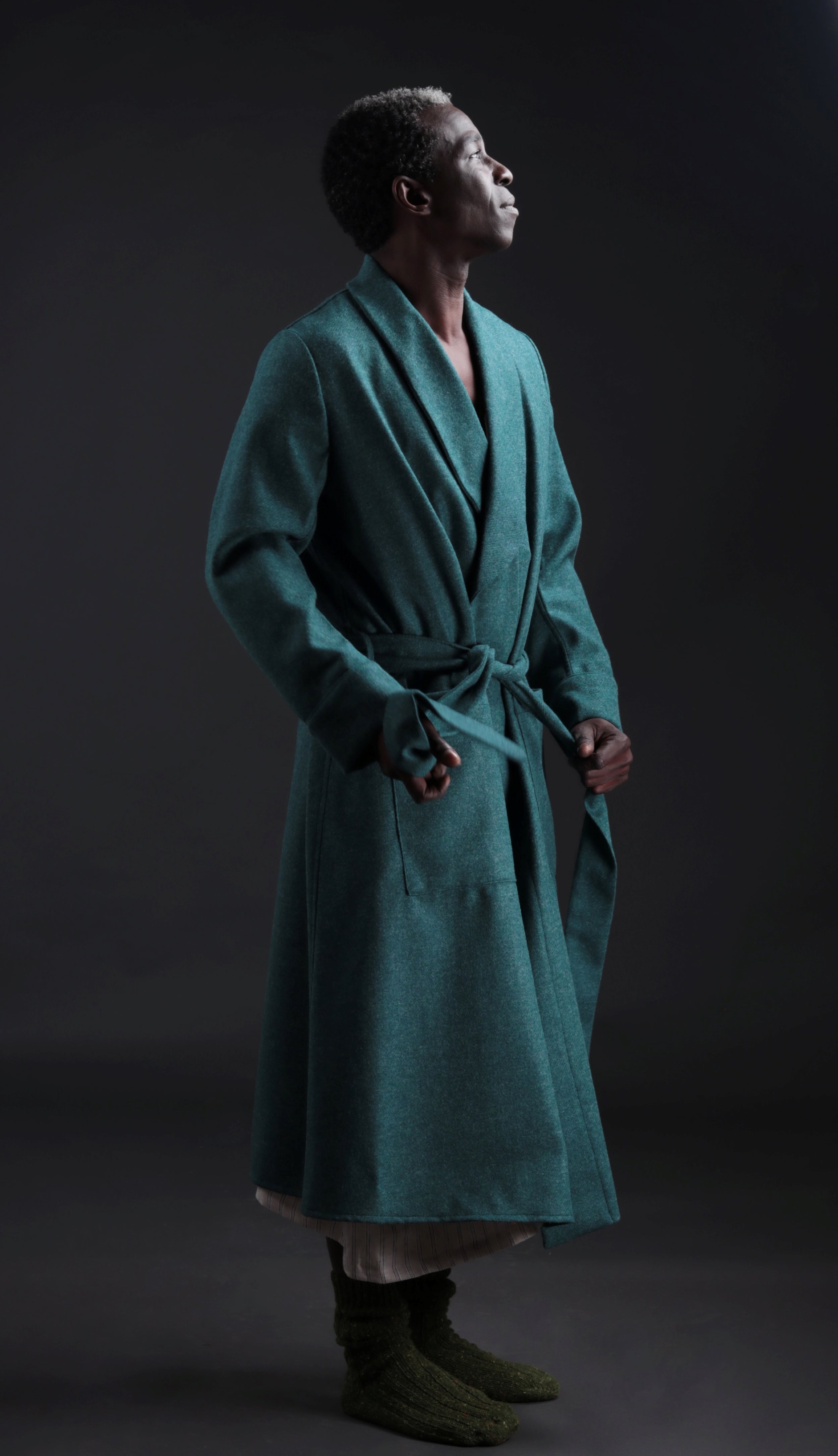 Man wears Carrier Company Wool Dressing Gown in New Teal