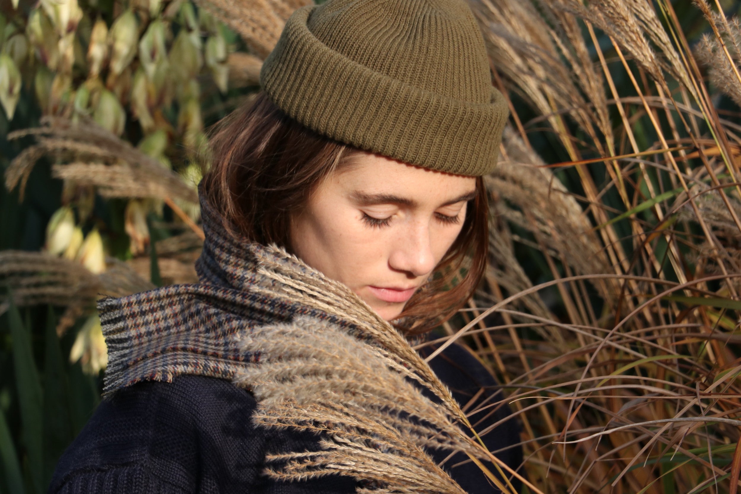 Decca wears Le Tricoteur Premium Guernsey in Navy with Wool Hat in Olive Drab