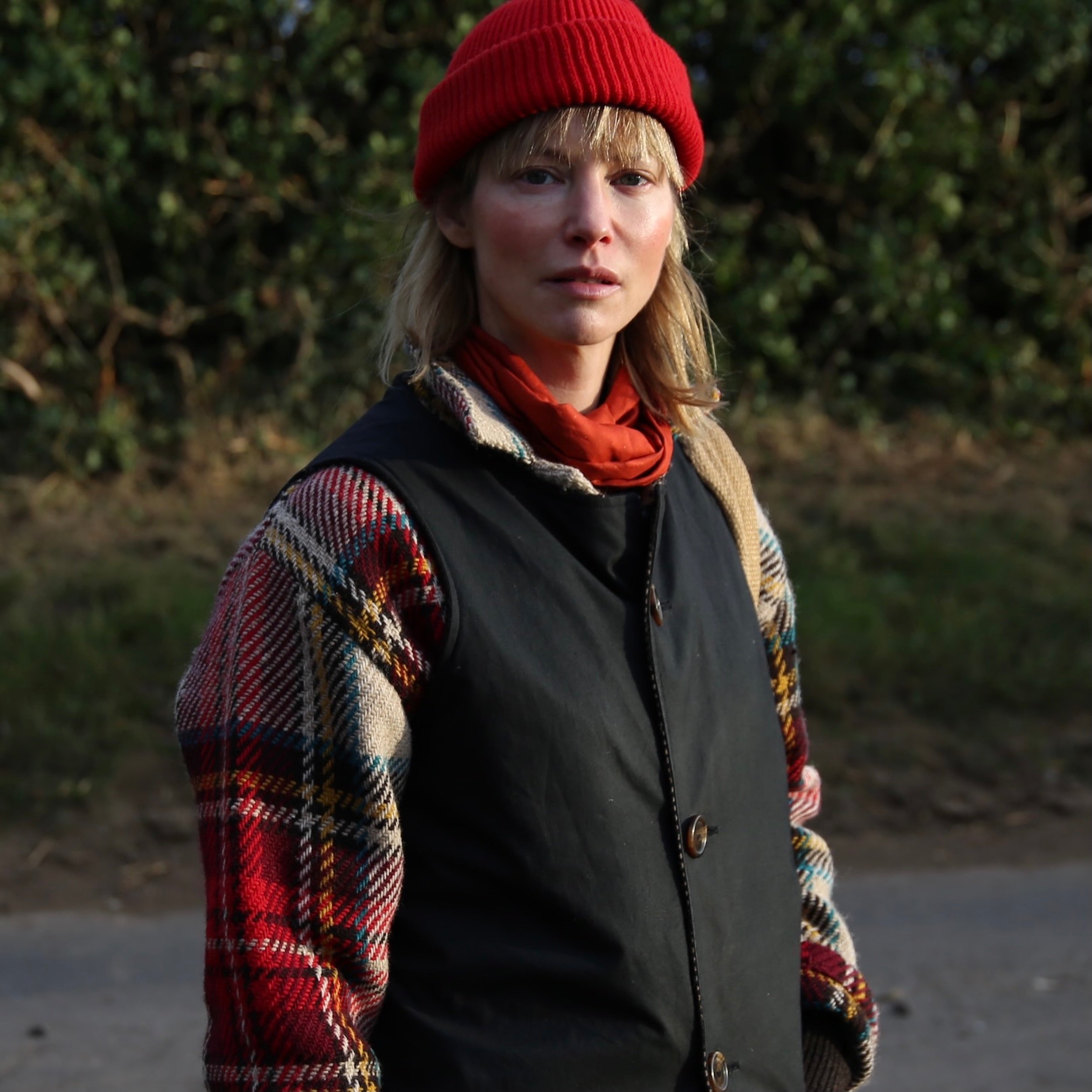 Woman wearing Carrier Company Norfolk Jerkin in Navy and Celtic Wool Jacket