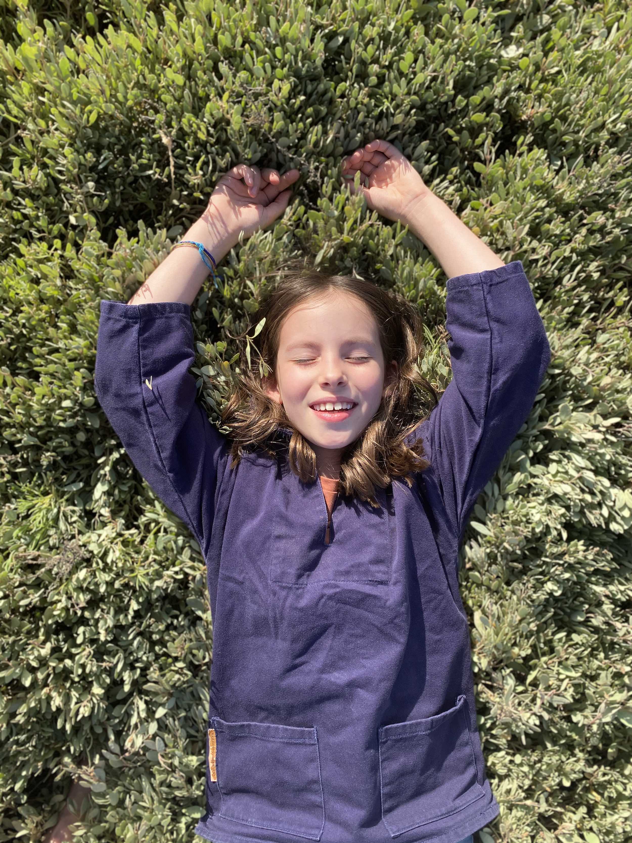 Girl wears Carrier Company Child's Traditional Smock