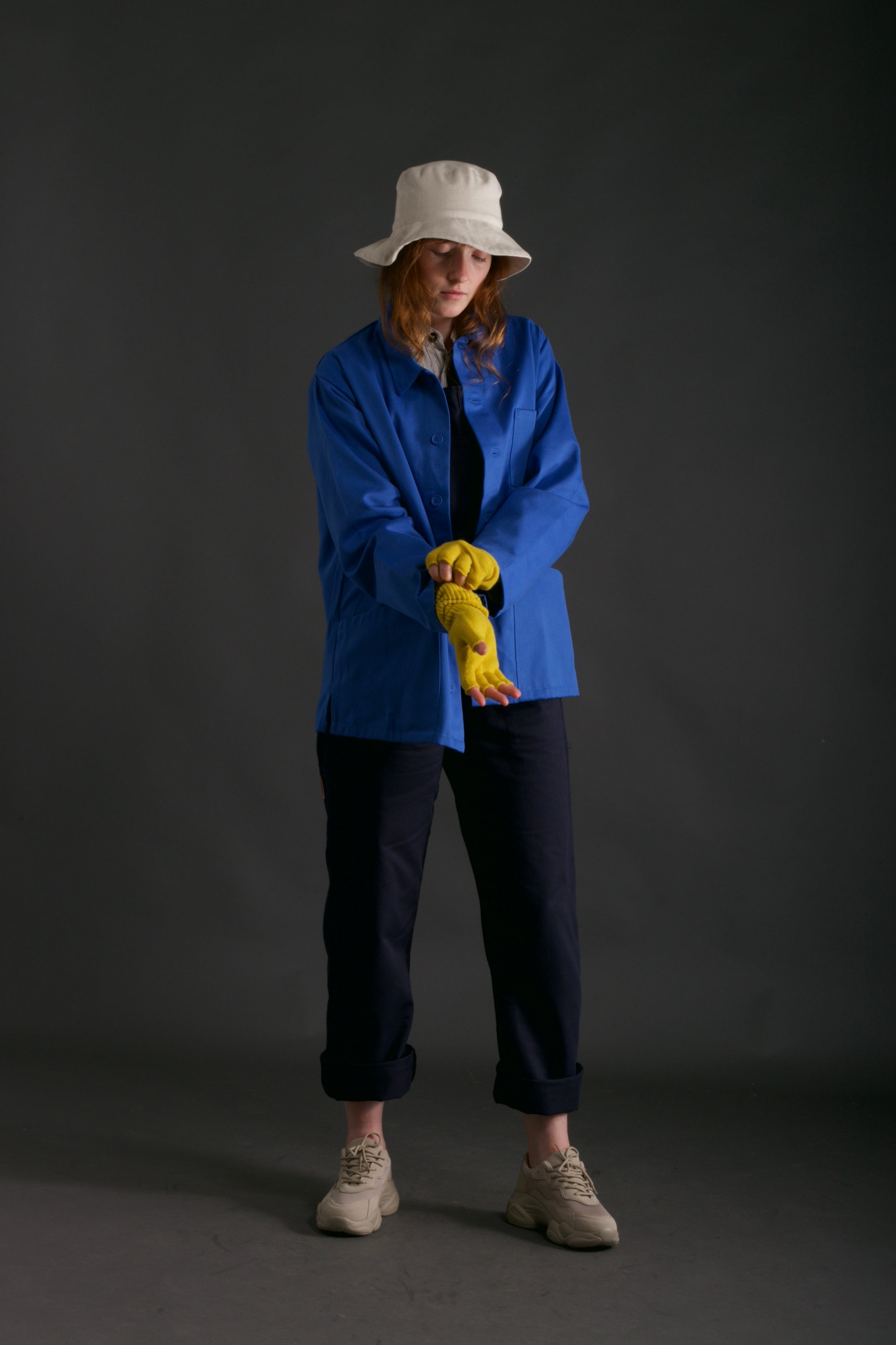 Woman wears Carrier Company Traditional Work Jacket in Sky Blue with gathering Glove