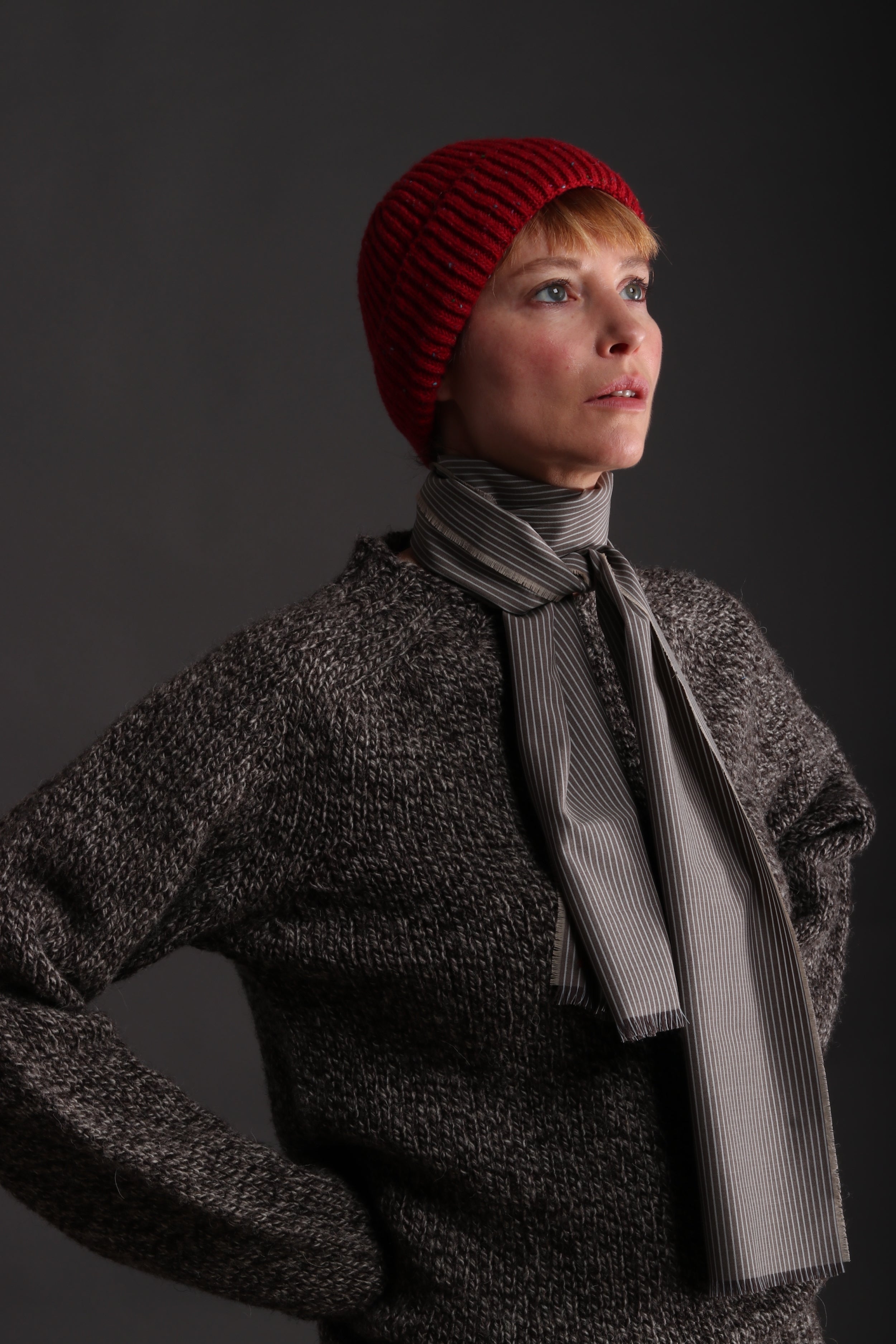 Woman wearing Carmine Donegal Wool Hat with Heavy Heritage Breed Lambswool Jumper in Jacob