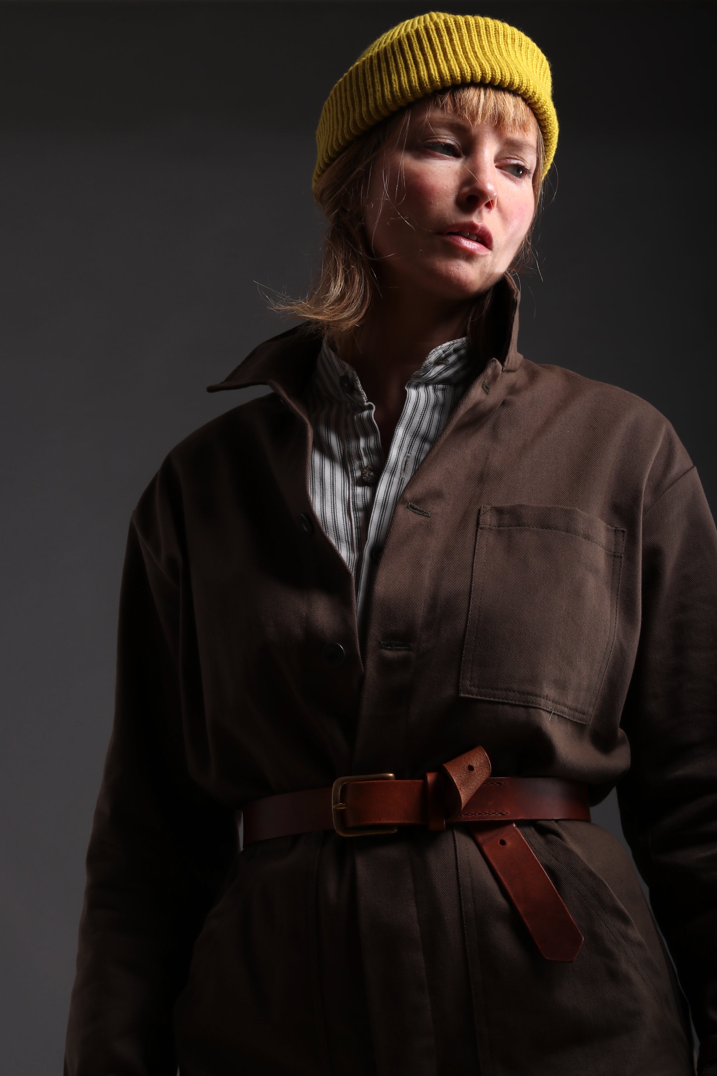 Woman wearing Carrier Company Wool Hat in Yellow, Collarless Work Shirt and Carrier Company Boiler Suit