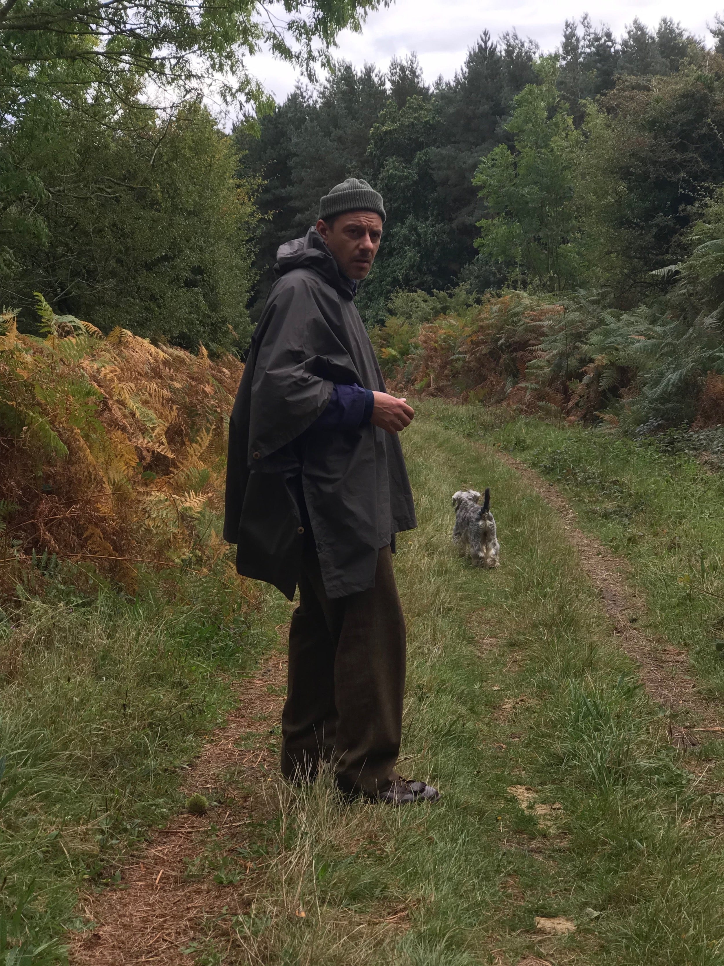 Man wearing Carrier Company Rain Cape