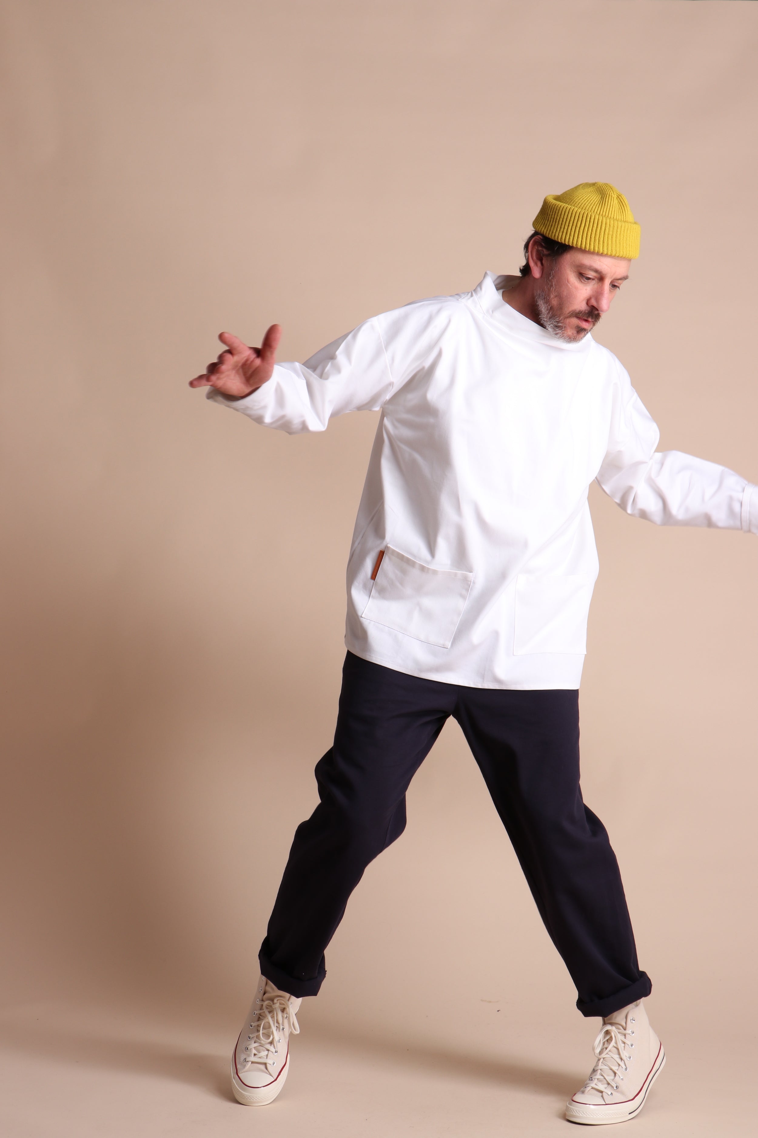 Man wearing Carrier Company Traditional Norfolk Slop in White with Classic Trouser in Navy and Wool Hat