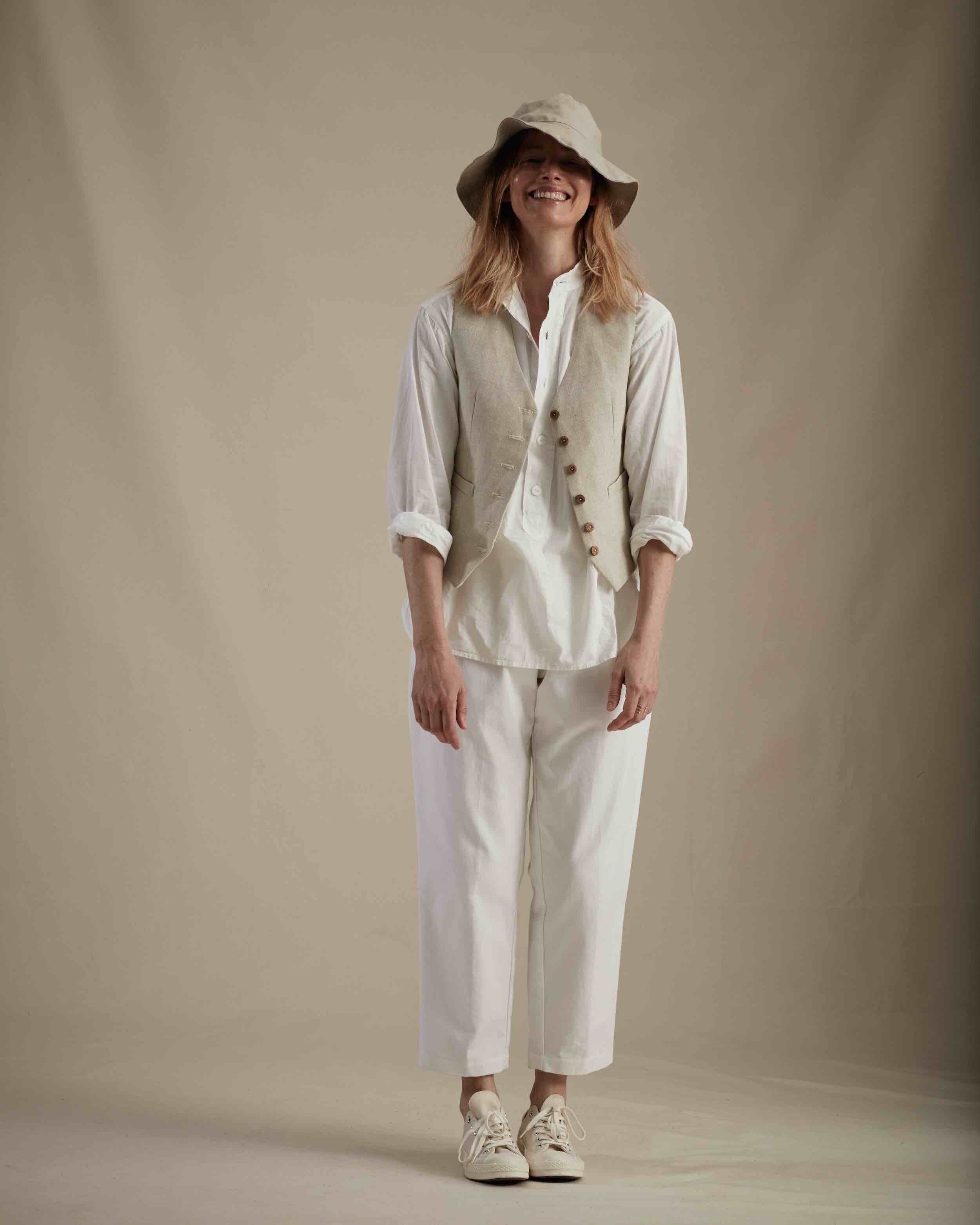 Woman wearing Carrier Company Cropped Trouser in White with Women's Waistcoat and Lightweight Collarless Shirt