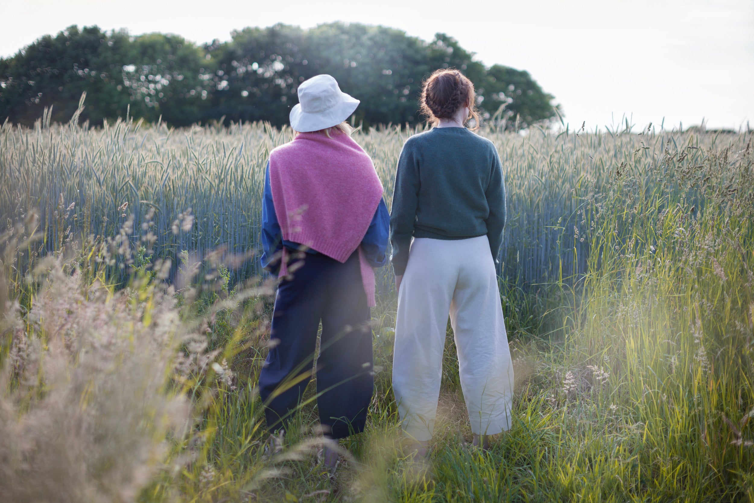 Woman wears Carrier Company Dutch Trouser in Seeded Denim with Shetland Lambswool jumper