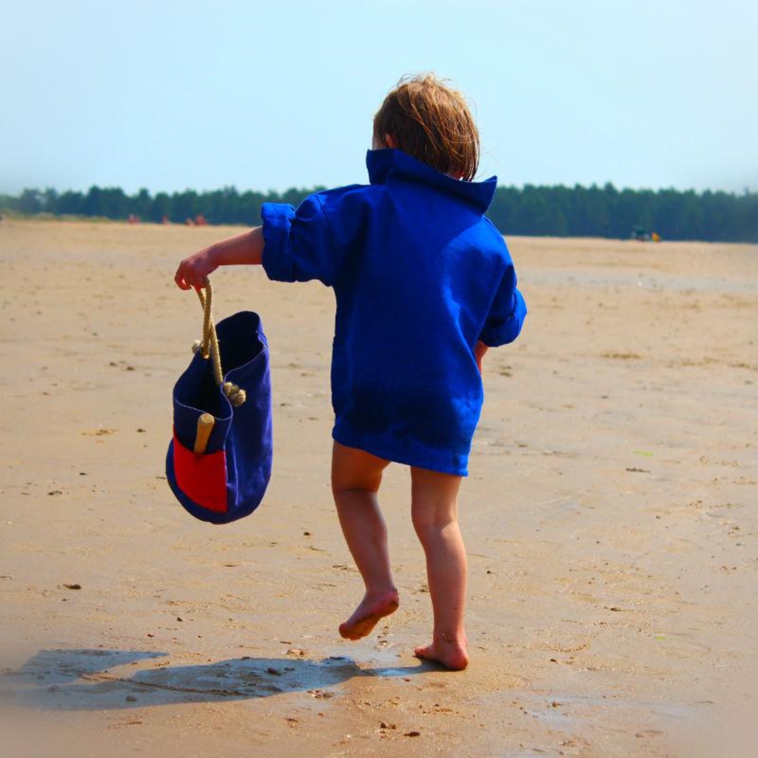 Child carries Carrier Company Canvas Toy Bucket