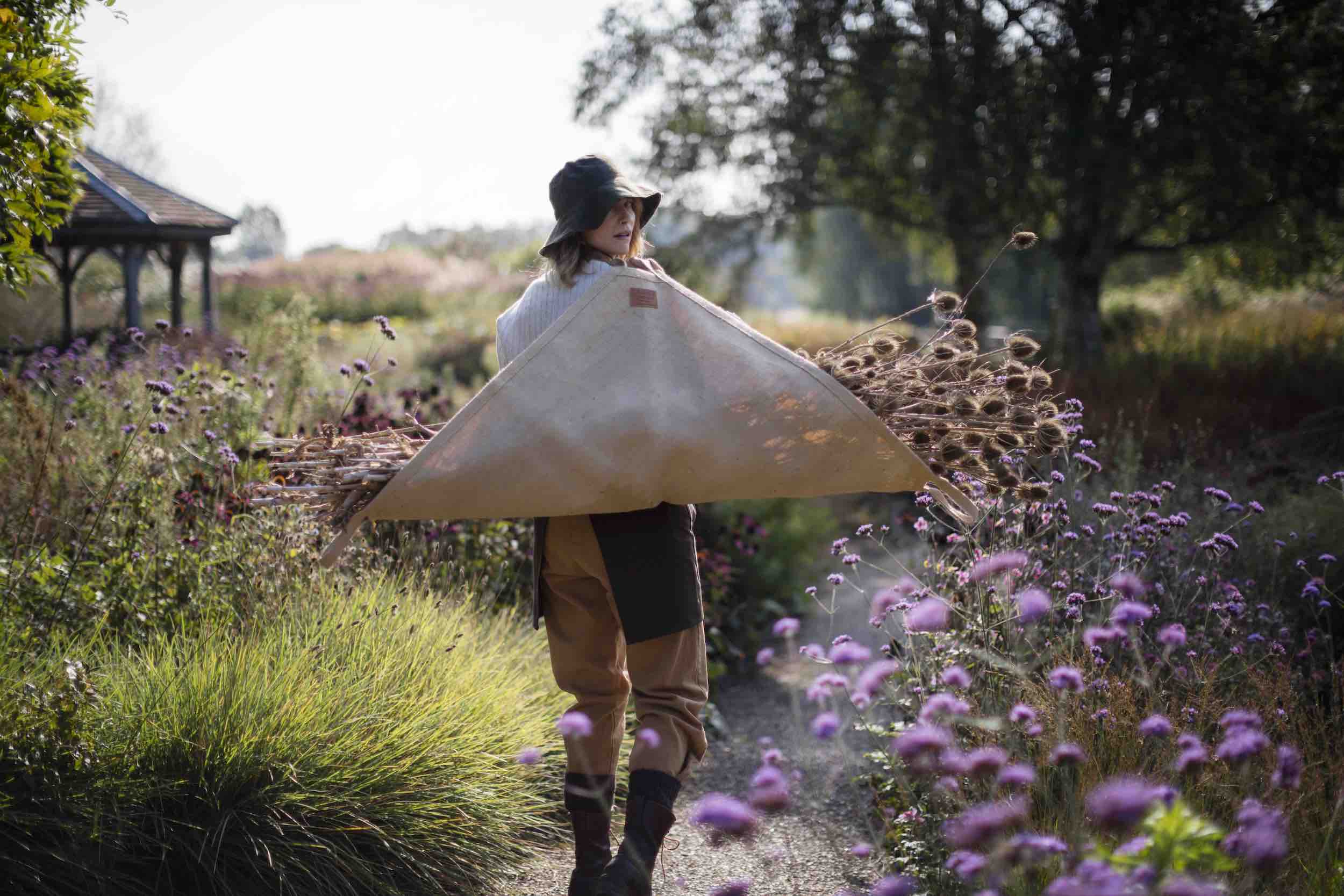 Woman uses Carrier Company Classic Carrier in Jute