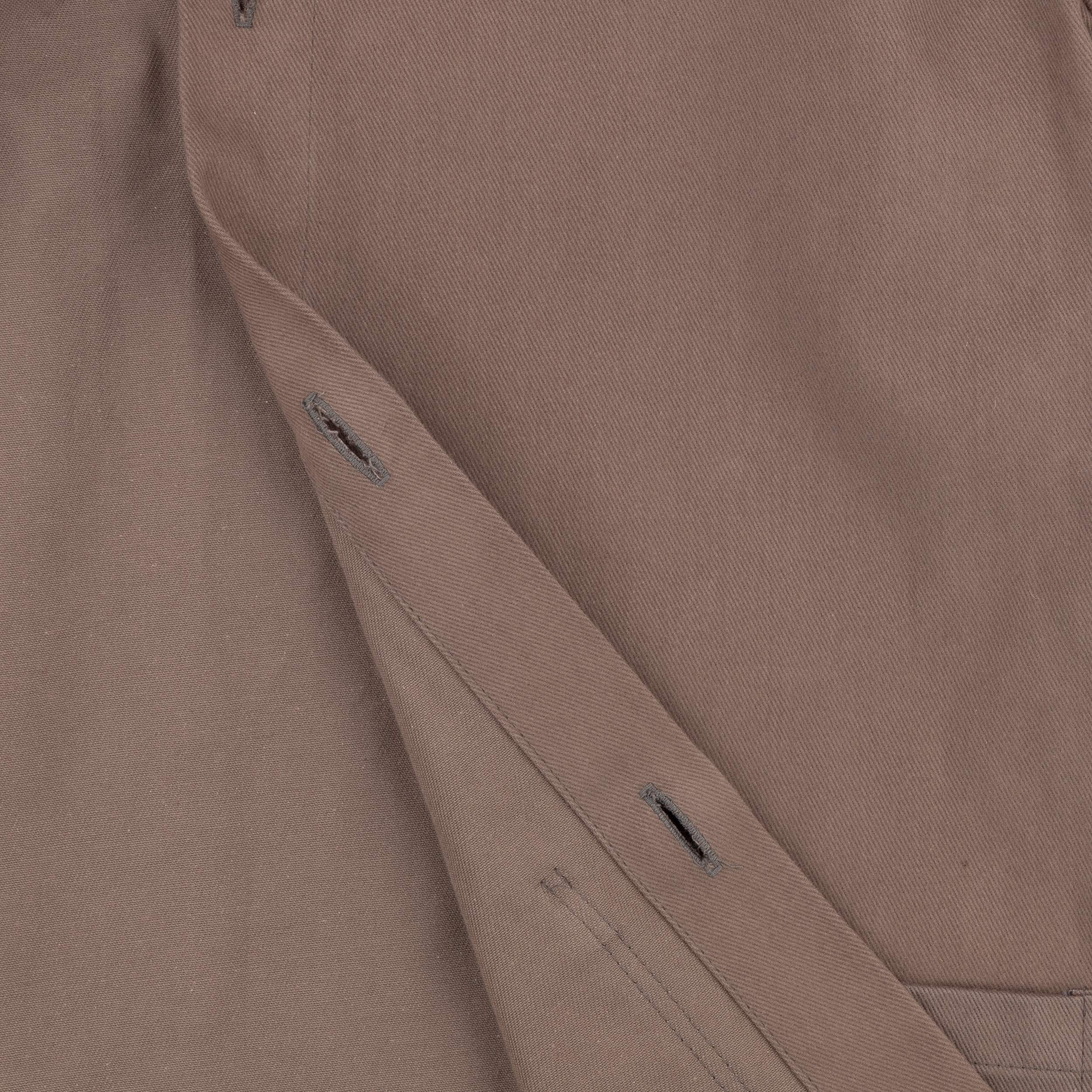 Close up of the button seam of the Carrier Company Draught Jacket