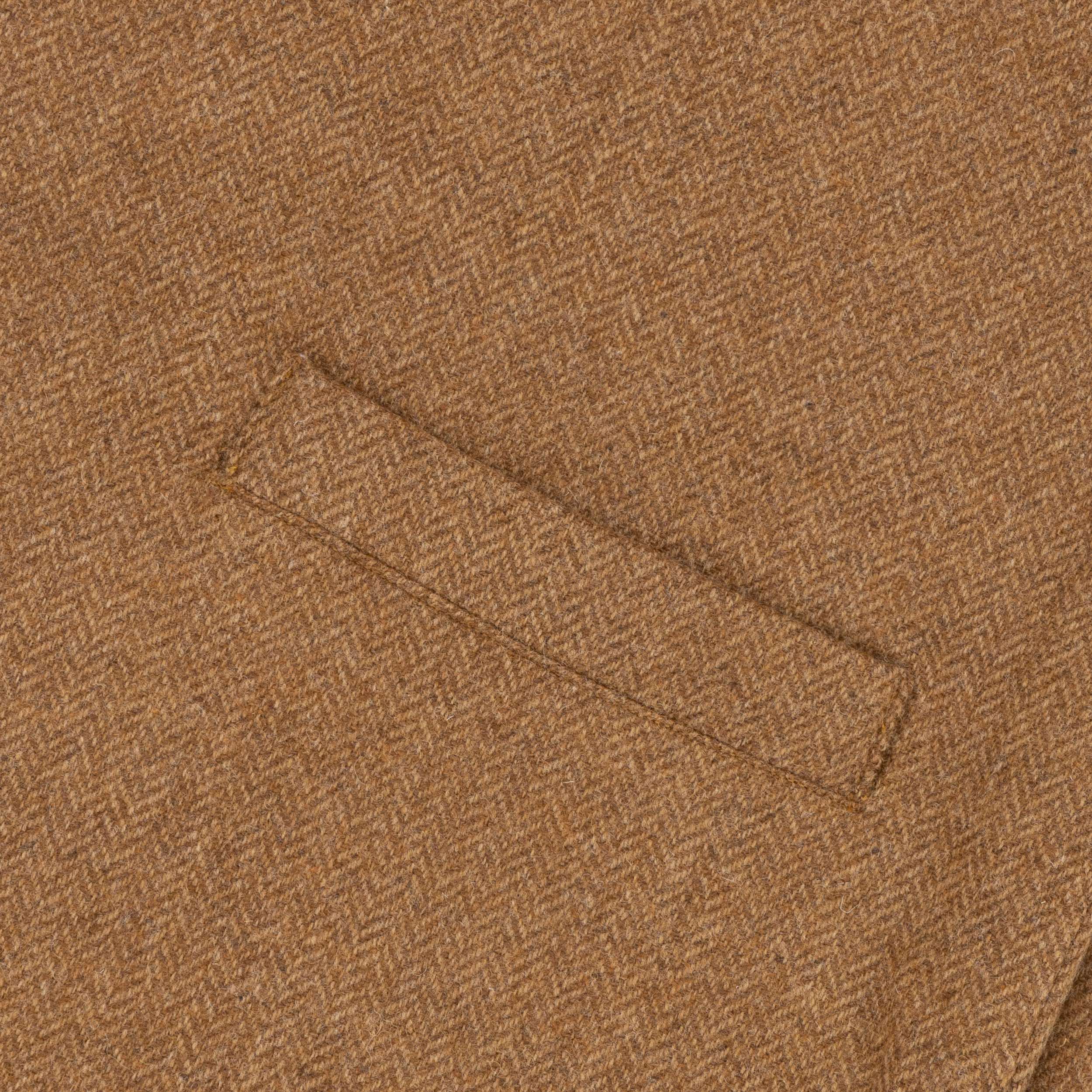 Close up of the pocket detail on the Carrier Company Men's Wool Waistcoat in Ginger Herringbone